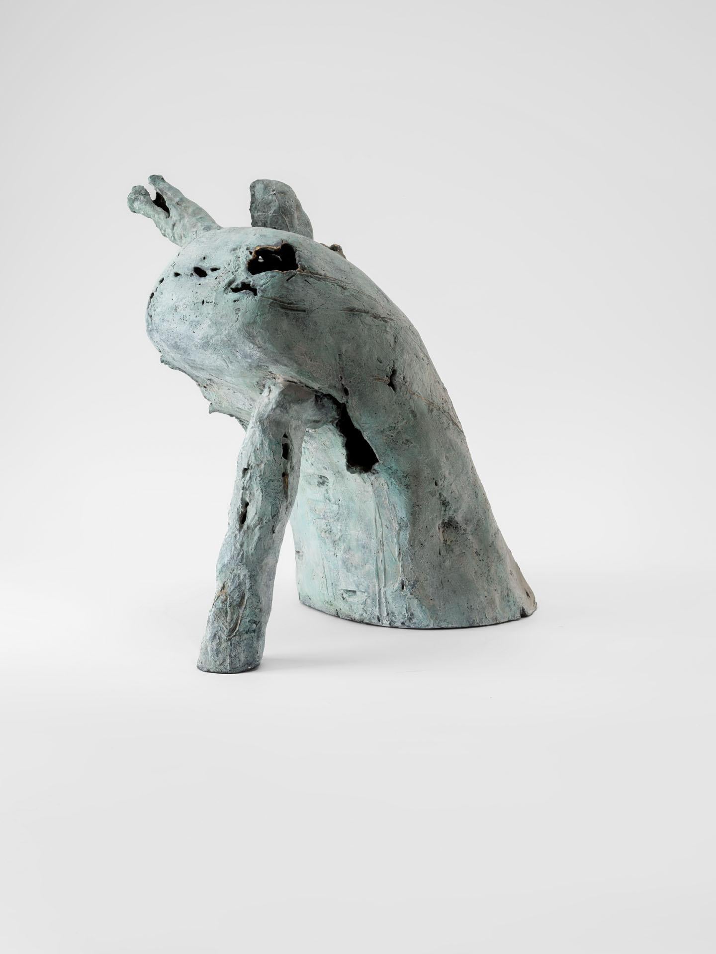 Italian The leaning outcast, contemporary sculpure in cast bronze, white-green patina For Sale