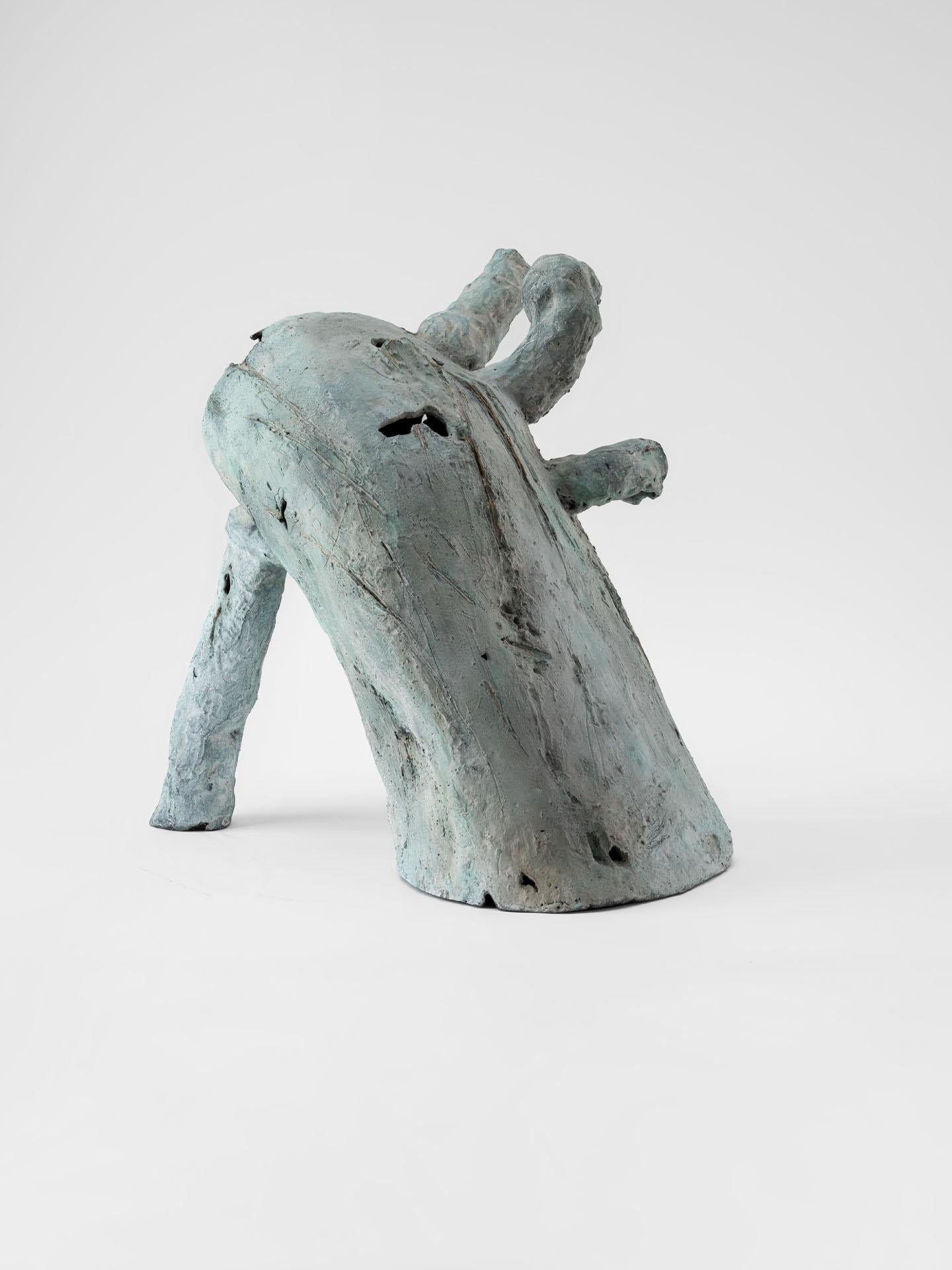 Cast The leaning outcast, contemporary sculpure in cast bronze, white-green patina For Sale