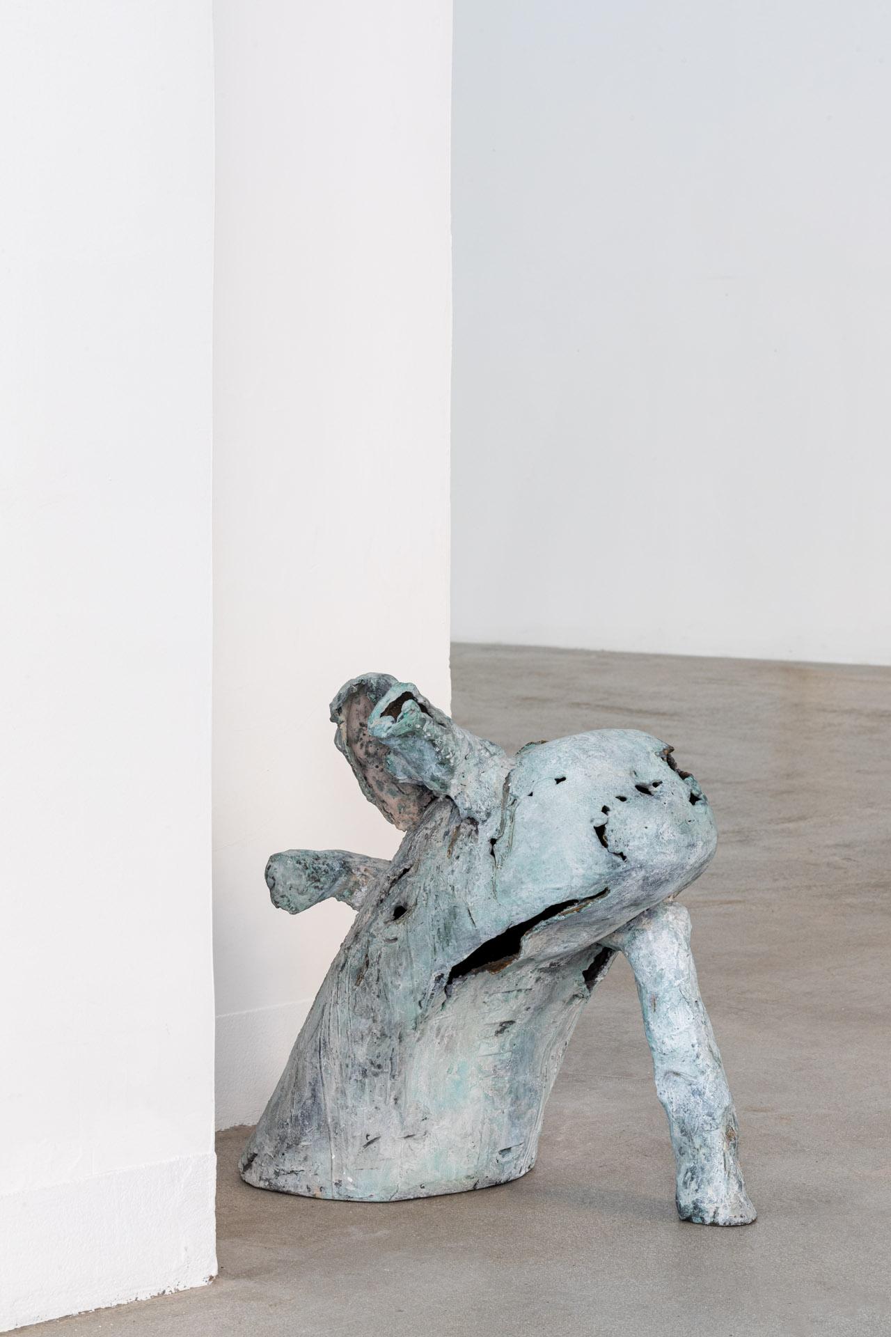 Contemporary The leaning outcast, contemporary sculpure in cast bronze, white-green patina For Sale