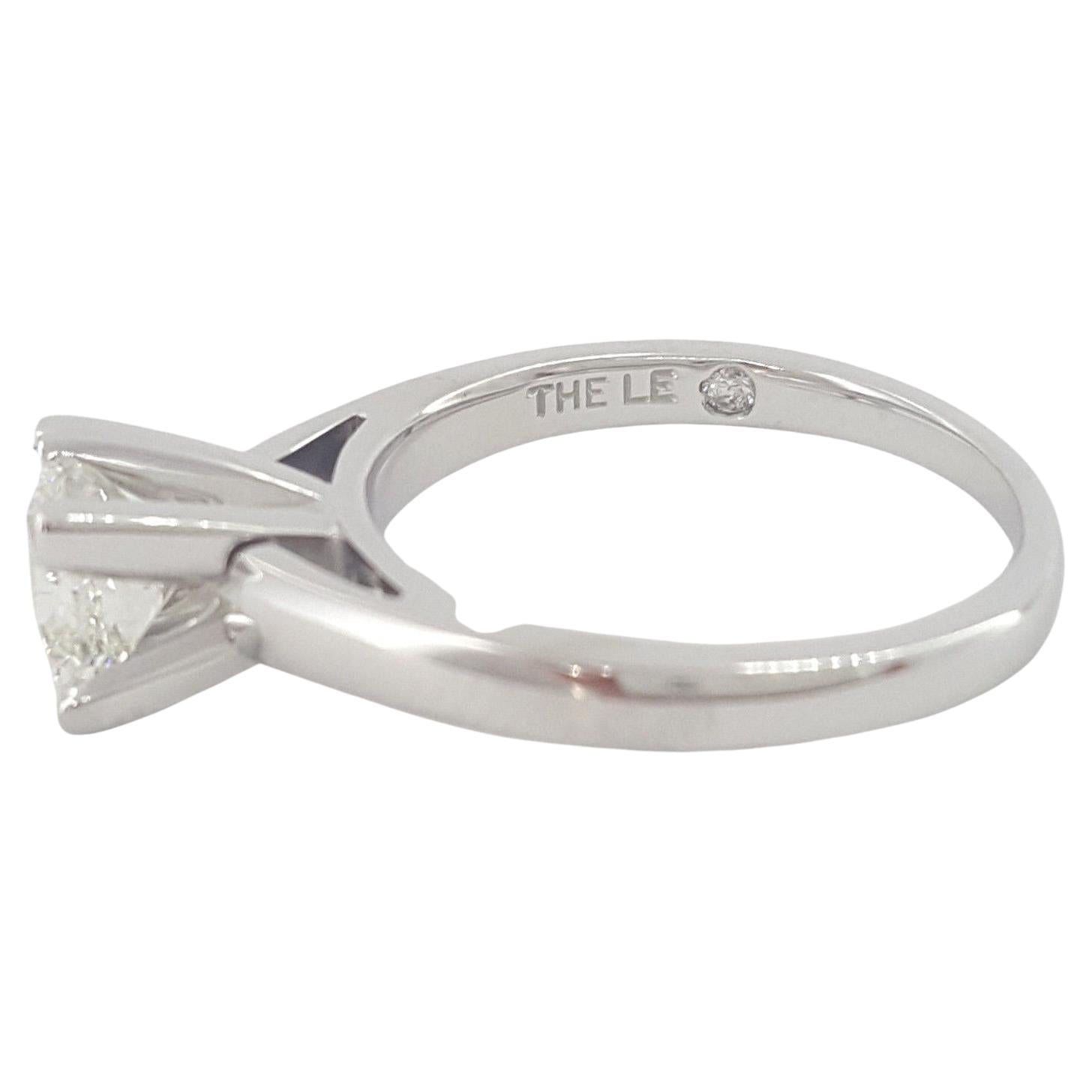 Leo Princess Brilliant Cut Diamond Solitaire Engagement Ring.



 The Shank is 14K White Gold,  the head is 950 Platinum, weighs 4.9 grams, size 6.5, the center is a Leo Princess Brilliant Cut diamond weighing 1 ct, I in color, and VS2 in clarity.