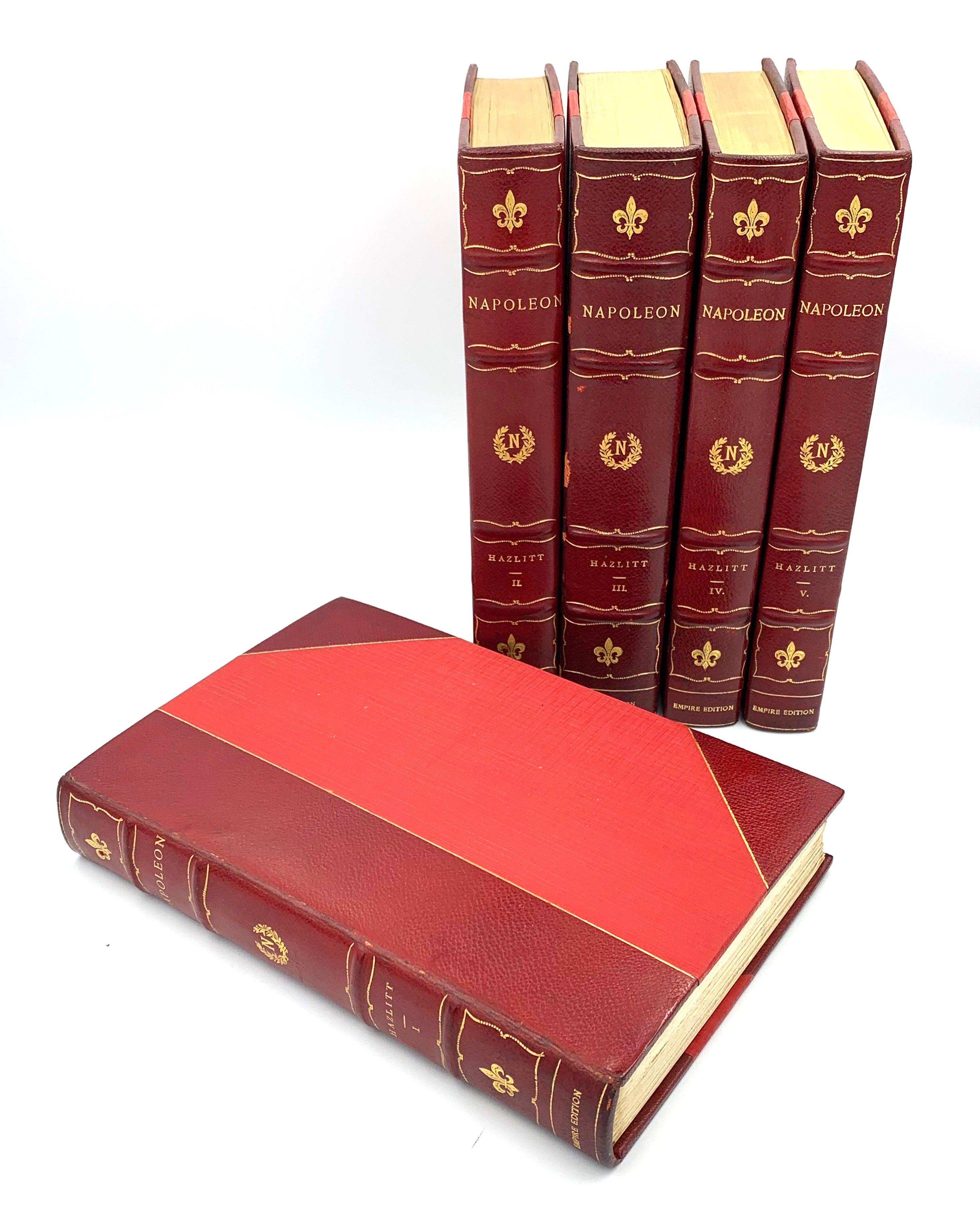 Hazlitt, William. The Life of Napoleon. New York: The Grolier Society, [c. 1900]. Empire Edition, no. 80 of 425 sets. Octavo. Five volumes. Illustrated throughout. Presented in 3/4 red Moroccan leather and red cloth boards with gilt titles, tooling,