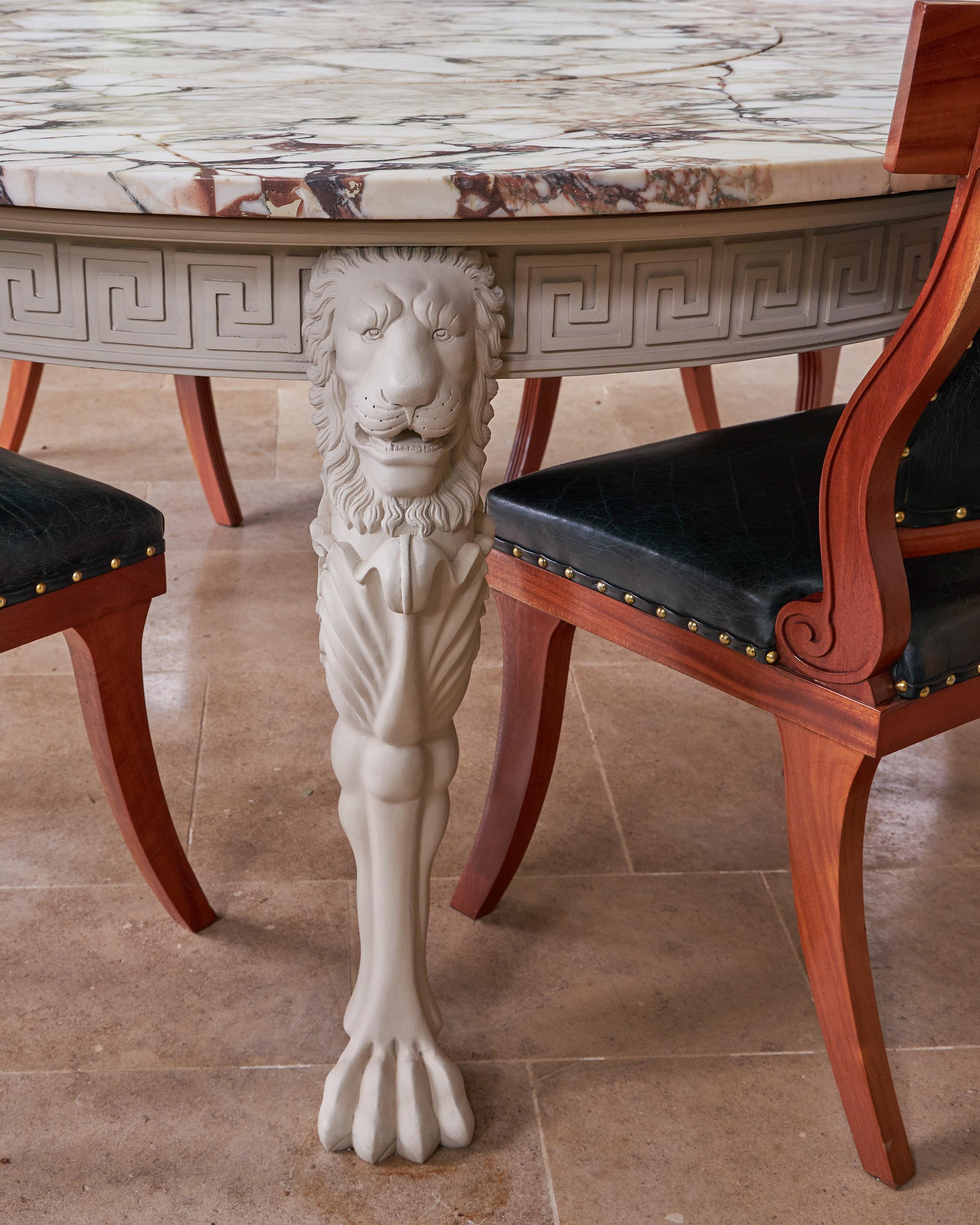 A fine Regency design grand tour carved wood four-legged lion monopode hall table. The legs and frieze supported by a circular crema marble top. Bespoke finishing available. Other marbles to be quoted for separately.