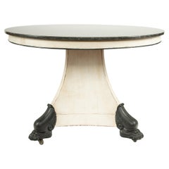 The Lion’s Foot Table: 19th C Center Table w/ Marble Top and Iron Lion Paw Feet