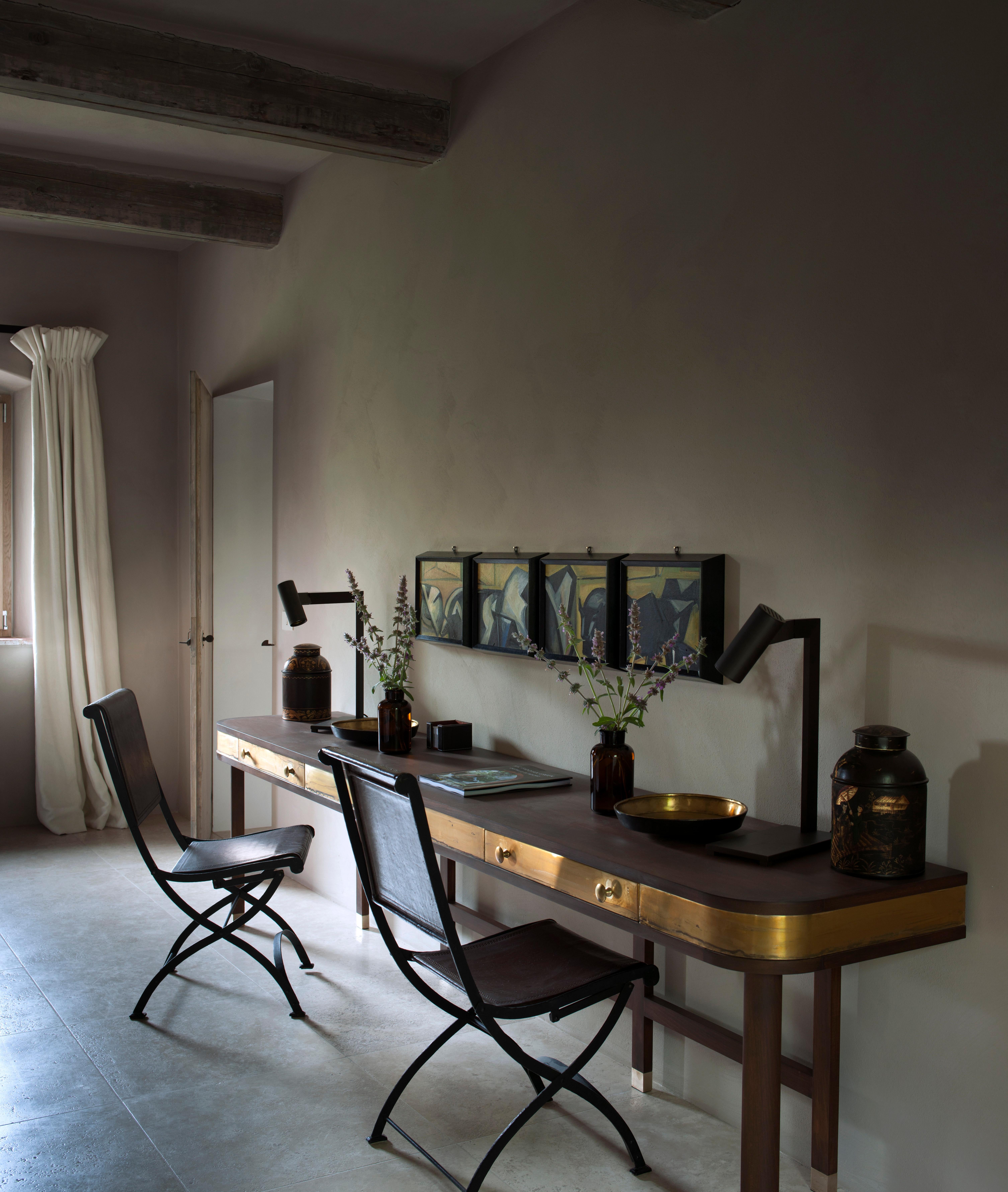 A long solid beech side table with patinated brass cladding and shoes

B.B - Inspired by jewelery work benches of centuries gone by, this side table with its rounded edges works well on large empty walls.
Used as a console or a desk, as display