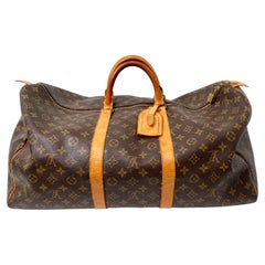 The Louis Vuitton Keepall 55 Monogram Coated Canvas Duffel Bag