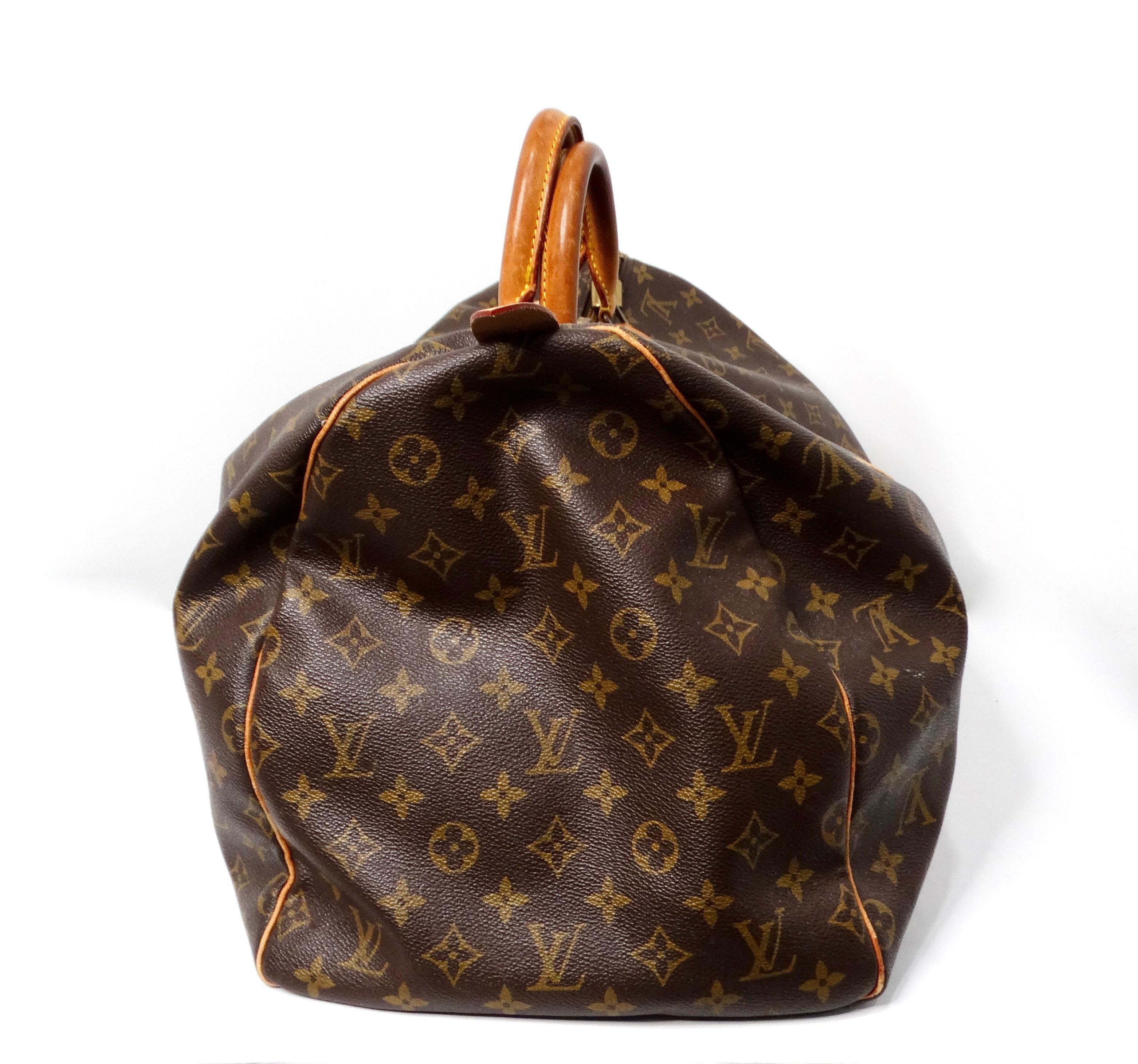 The Louis Vuitton Keepall 55 Monogram Coated Canvas Duffel Bag Marrón en venta