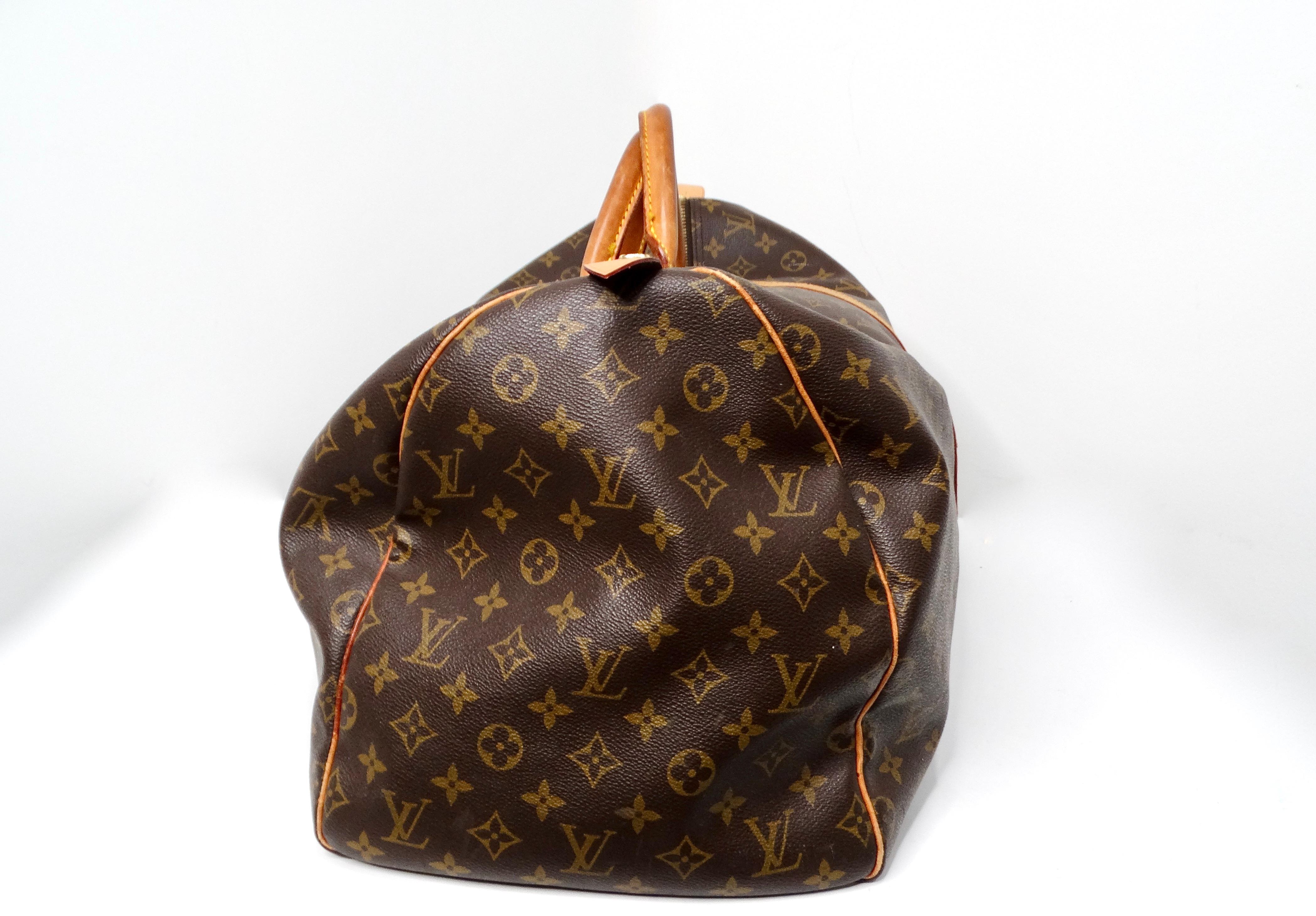 The Louis Vuitton Keepall 55 Monogram Coated Canvas Duffel Bag en venta 1