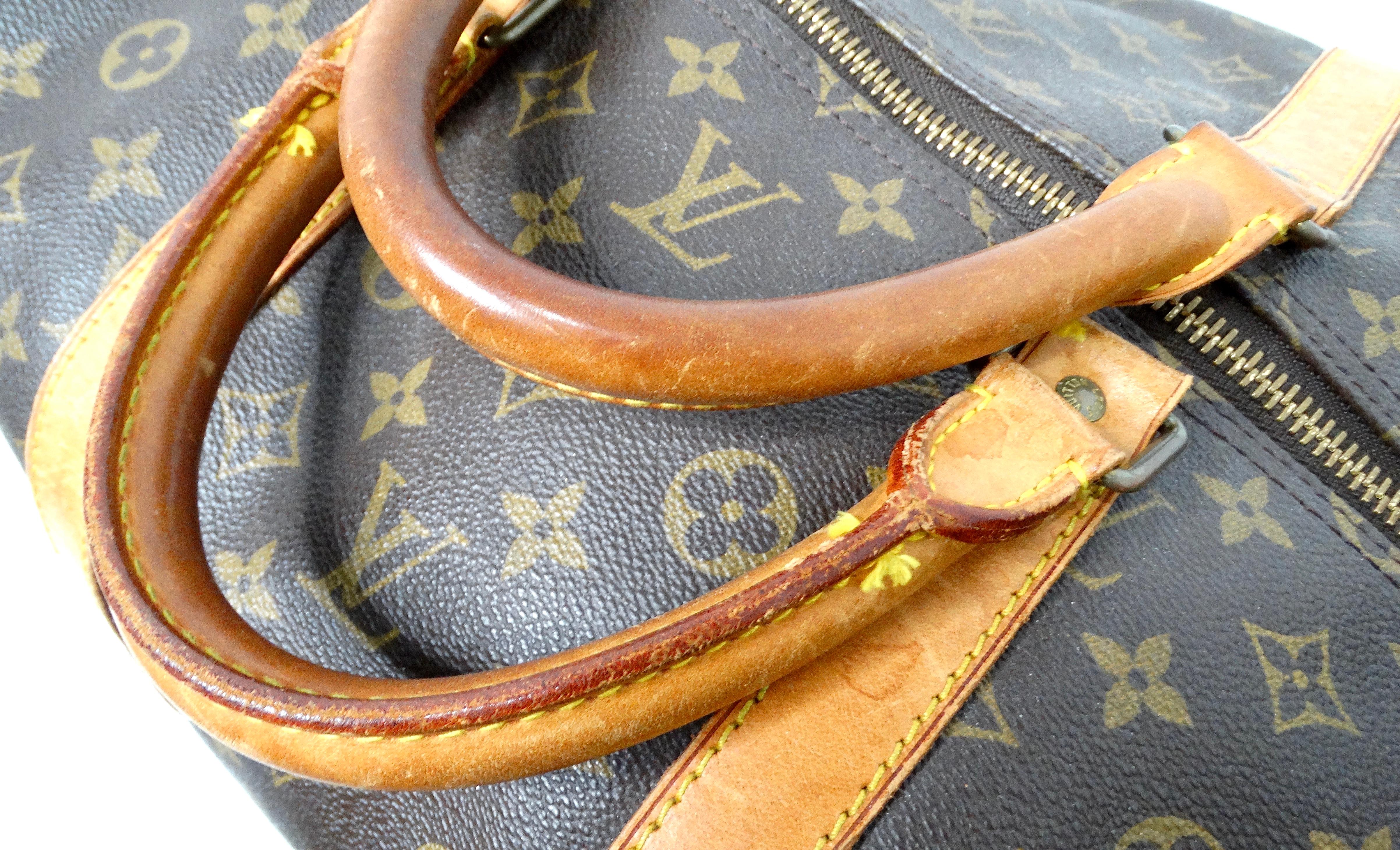 The Louis Vuitton Keepall 55 Monogram Coated Canvas Duffel Bag en venta 4