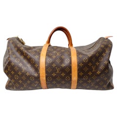 The Louis Vuitton Keepall 55 Monogram Coated Canvas Duffel Bag