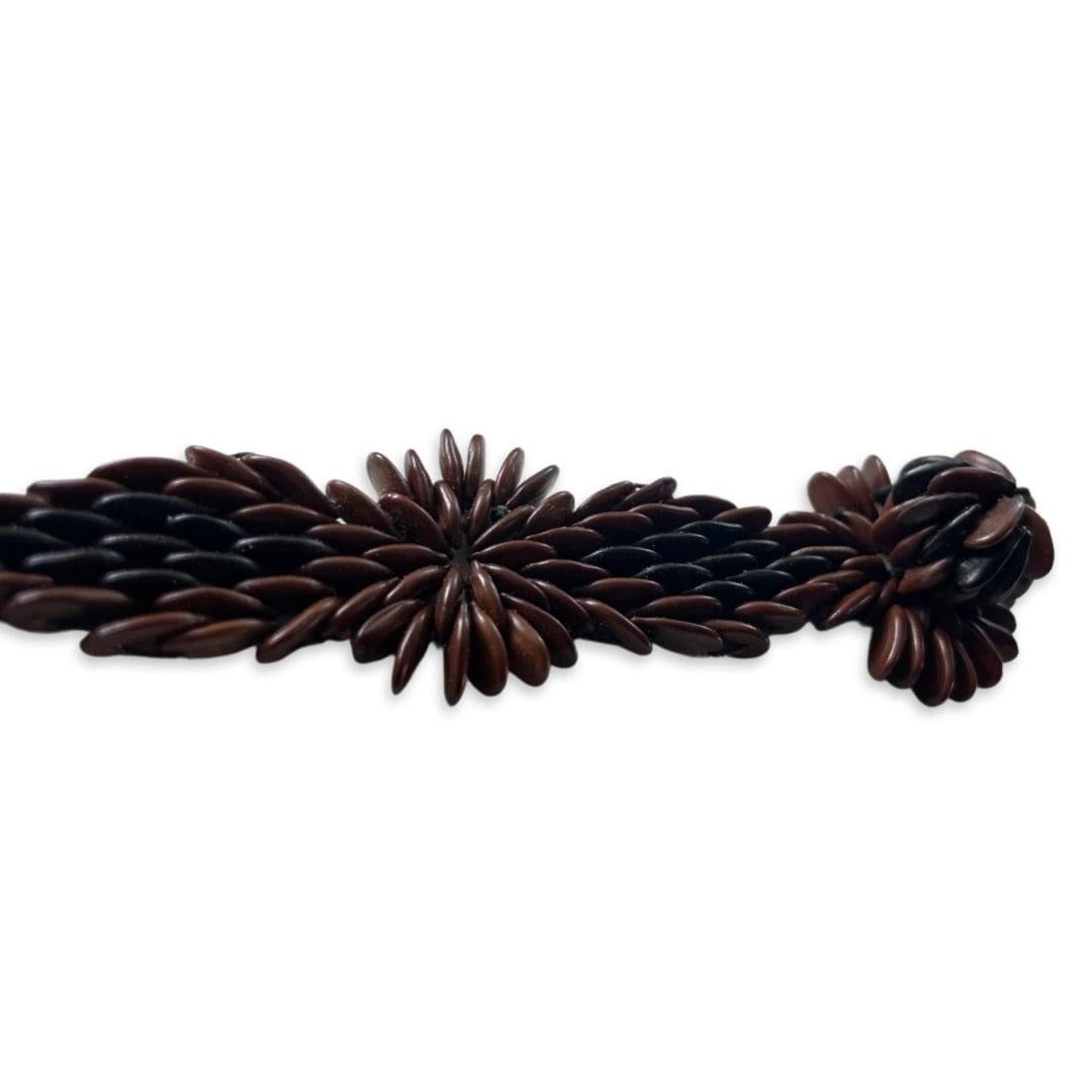 Capturing the mixture of tradition and vibrancy, the Louise Bracelet is a part of our “Artisan Collection,” lovingly named after one of our Master Seedwork Artisans, Louise Edwards.
This unique and handmade bracelet is created with wild tamarind