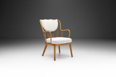 "La sedia da salotto" di Aage Herman Olsen per Fritz Hansen, Danimarca, 1940