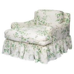 The Lucia Armchair, with frilled skirt, upholstered in Fuchsia Linen Silver Leaf