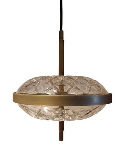 The Macaron Pendant made by hand from Cut Lead Crystal and hand tooled Brass