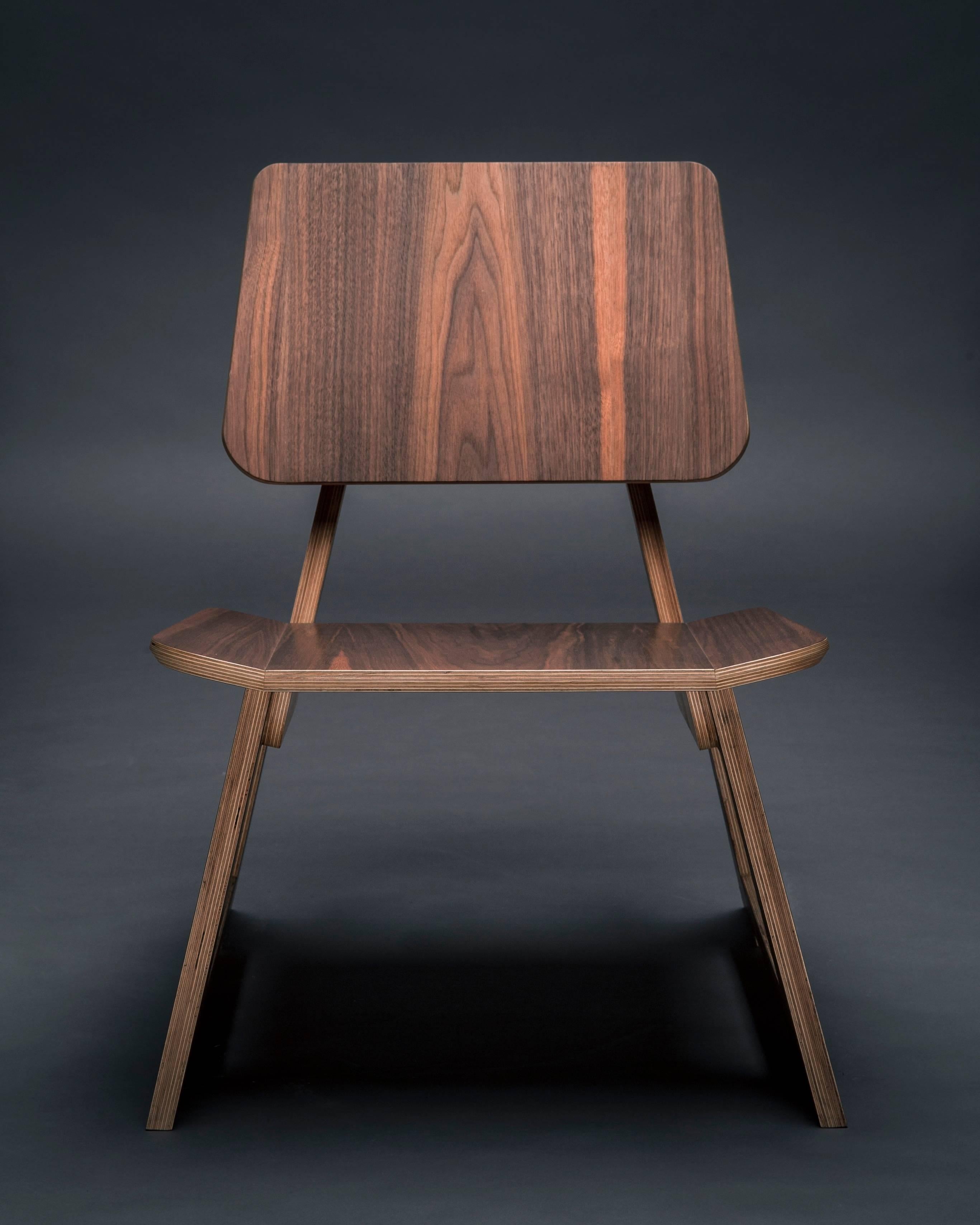 The Mafoo lounge chair is hand made to order and can be made in a variety of veneers and fabrics.