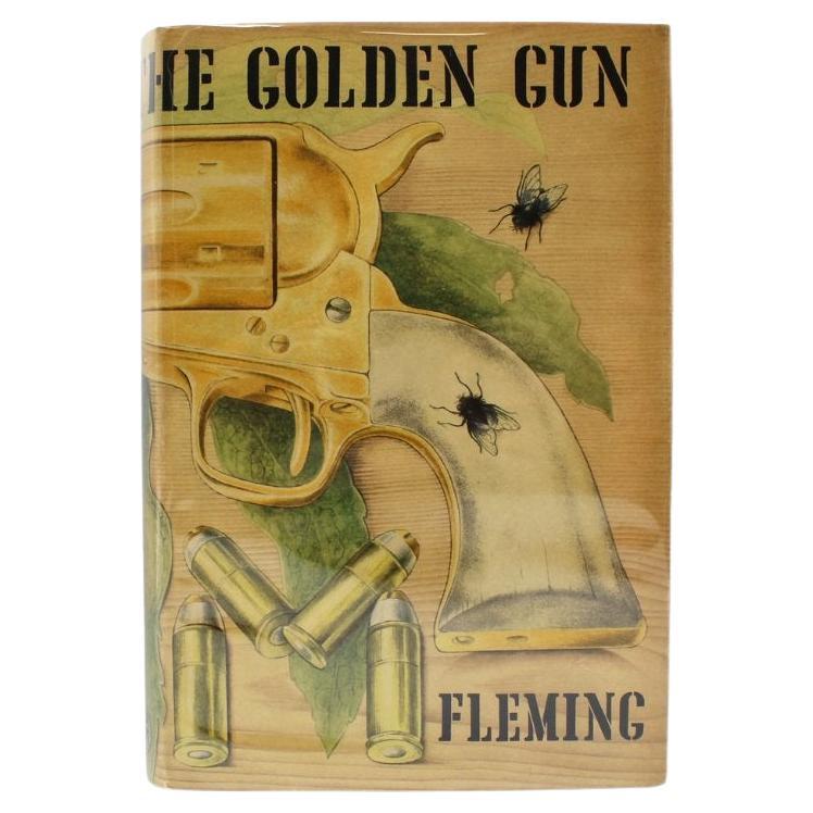Fleming, Ian. L'homme au pistolet d'or. Londres : Jonathan Cape, 1965. Première édition, deuxième tirage. Impression octavo. Dans les cartons d'origine de l'éditeur en toile noire avec des titres dorés sur le dos. Dans la jaquette originale de