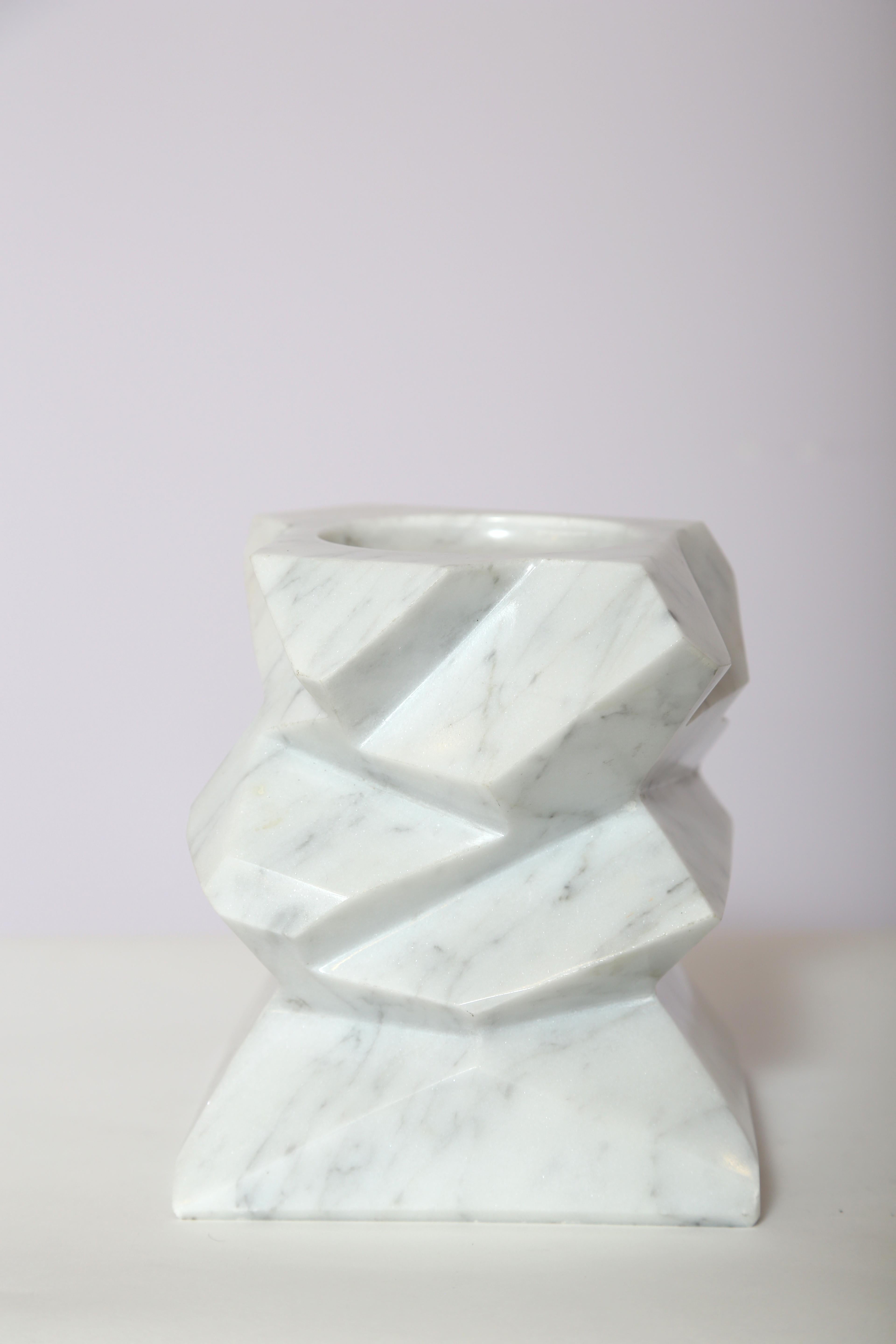 Rock candleholder in bianco Carrara. Handmade in Italy, this piece is available in Negro Marquina.
Measures: 5