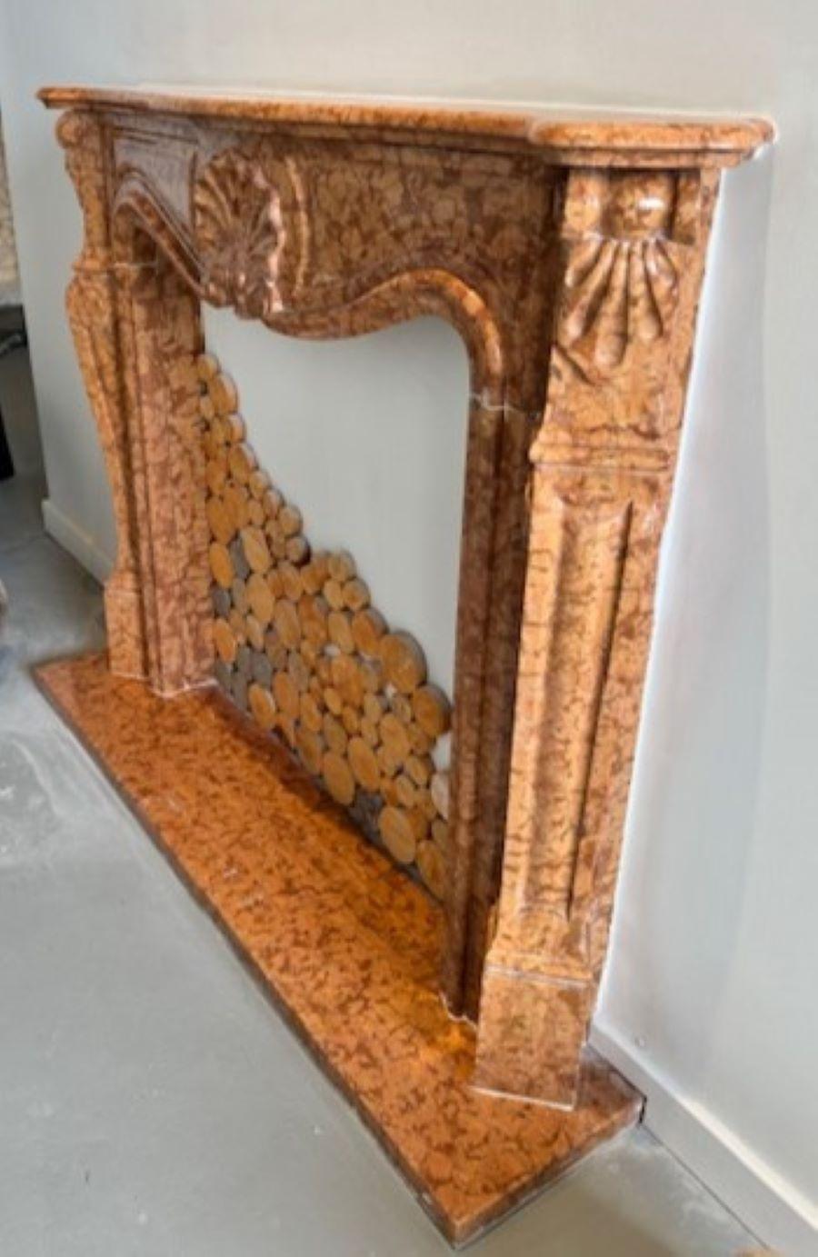 Carved The Marie Antoinette:  A Classical Stone Fireplace in the Style of Louis XV For Sale