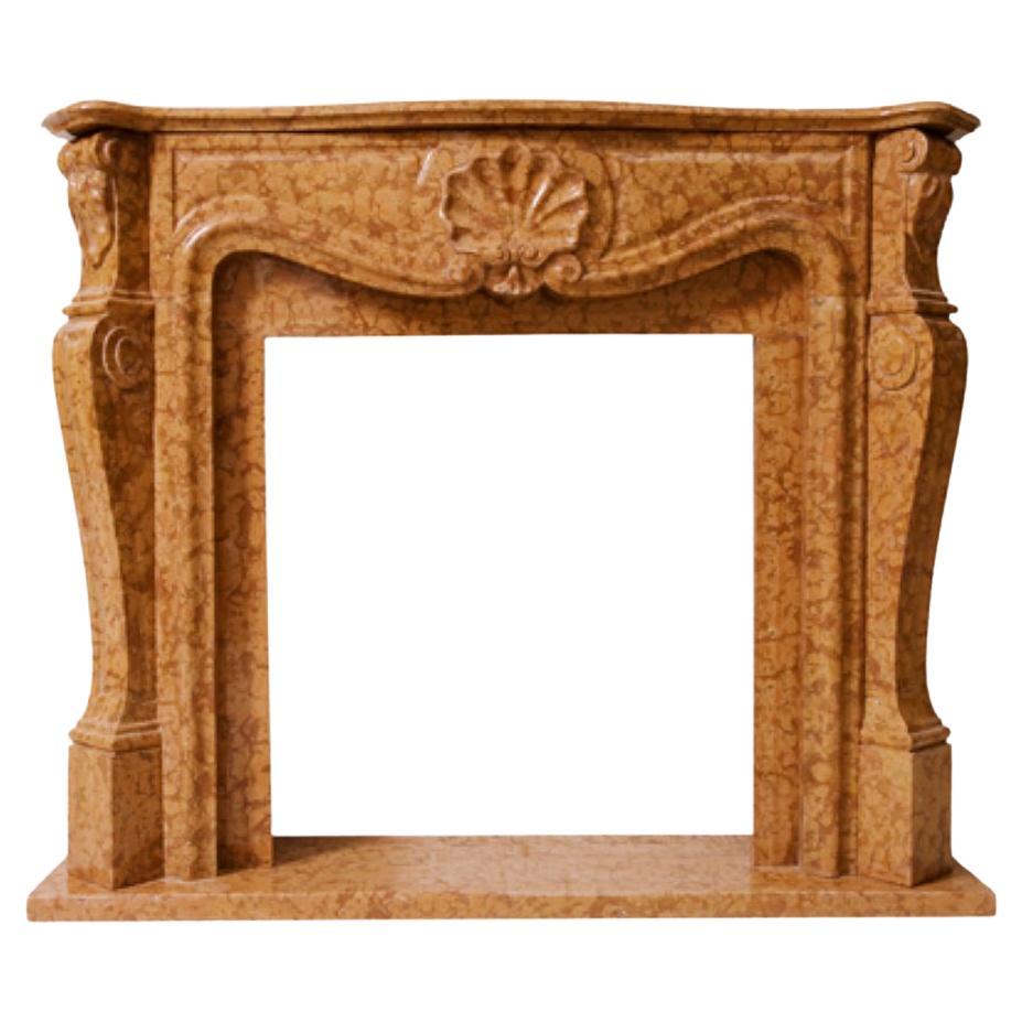 The Marie Antoinette:  A Classical Stone Fireplace in the Style of Louis XV For Sale