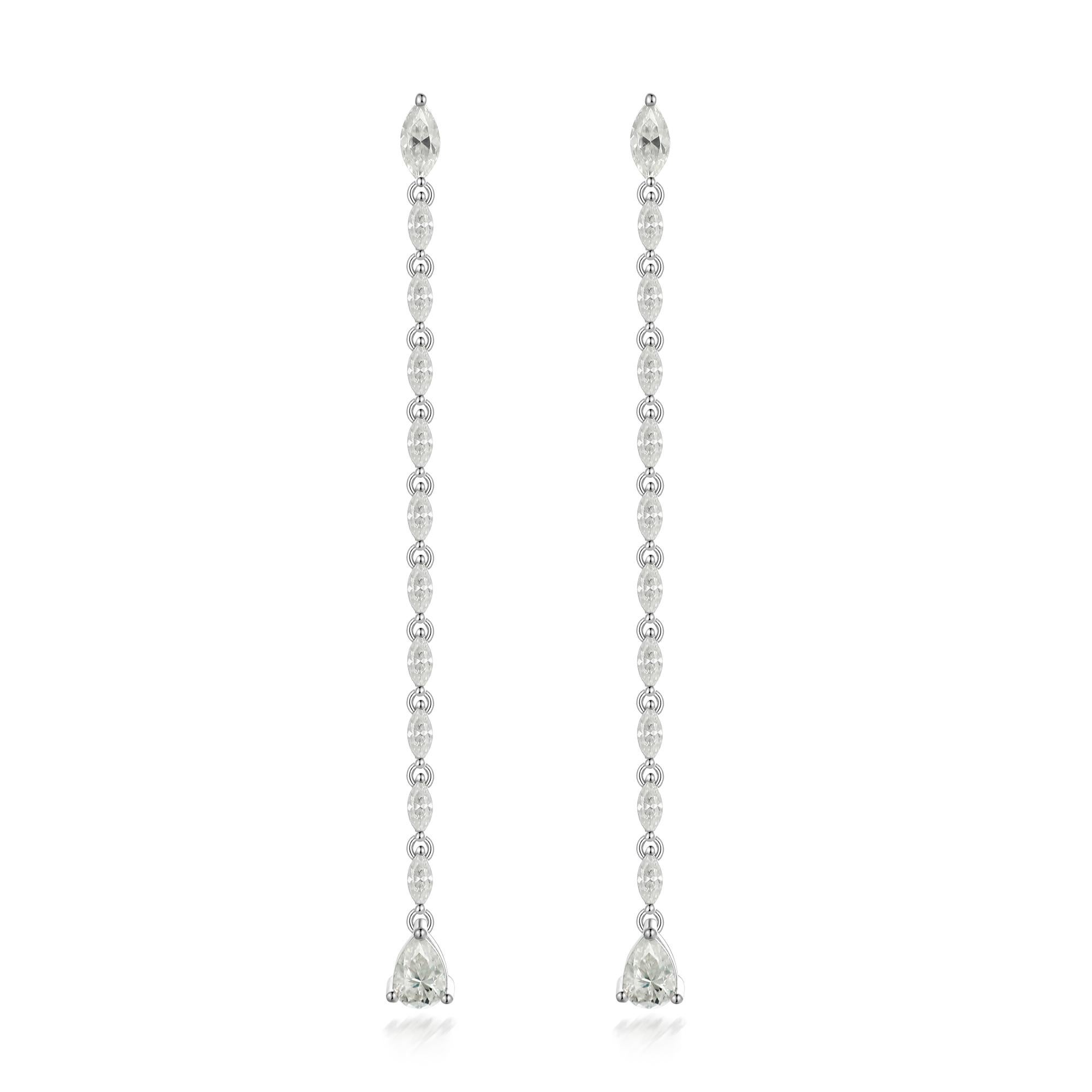 Earring Information
Diamond Type : Natural Diamond
Metal : 14k Gold
Metal Color : White Gold
Stone Type : Pear Diamond, Marquise Diamond

 
Elegant and eye-catching, these drop earrings in 14K white gold are a stylish take on the classic diamond