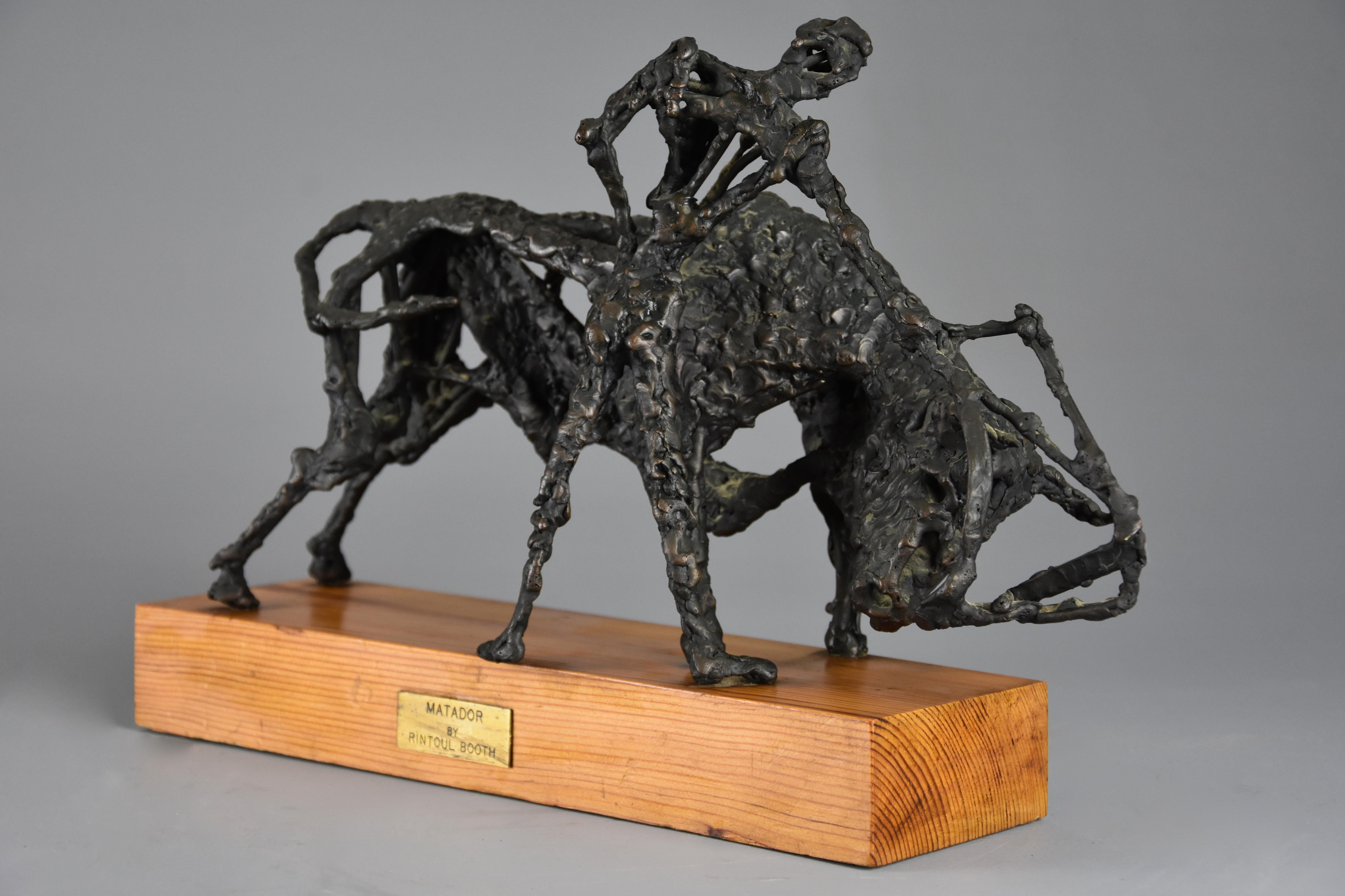 A bronze sculpture 'The Matador' by Daniel Rintoul Booth (1932-1978).

This bronze portrays a bronze Matador (or bullfighter) holding his cape near to the bull, supported on pine wooden base with brass plaque.

The sculptor, Daniel Rintoul Booth