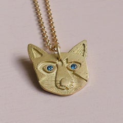 The Matilda Cat Ethical Amulet Pendant 18ct Fairmined Gold Blue Diamond Eyes