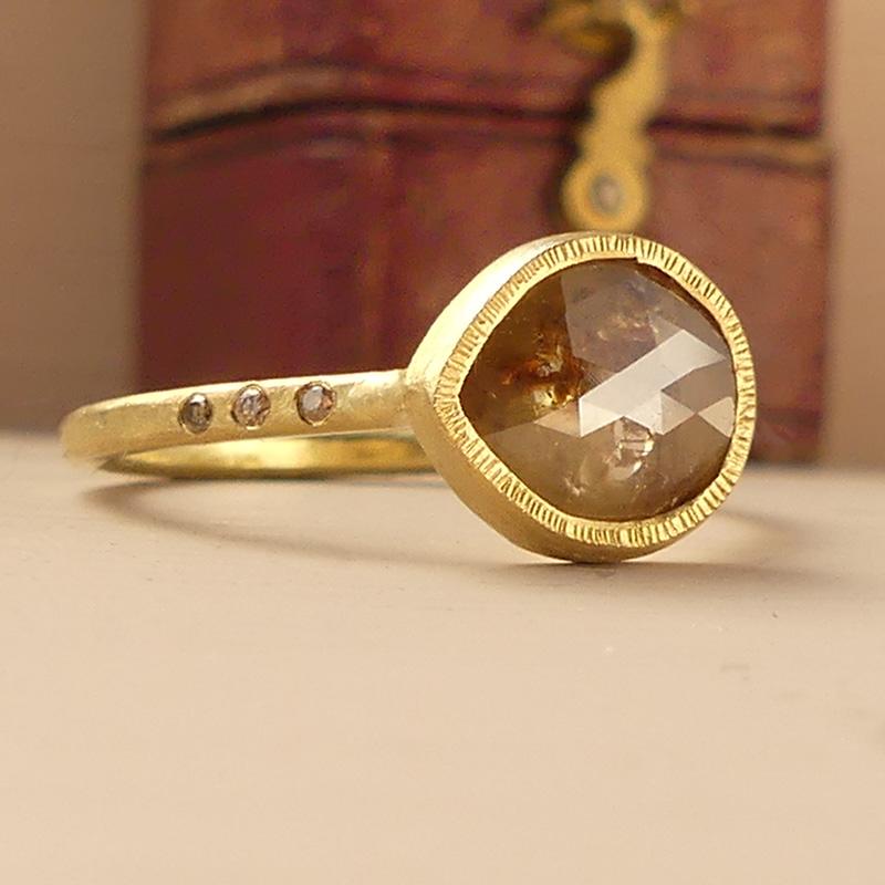 The Maya ethical engagement ring has a warm earthy elegance.  She’s one-of-a-kind, has been made with traceable and sustainable materials and would make a wonderful alternative to the traditional cookie cutter ring you find on the high street.

Made
