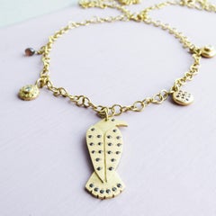 The Merla Crow Ethical Amulet Pendant 18ct Fairtrade Gold and Black Diamonds