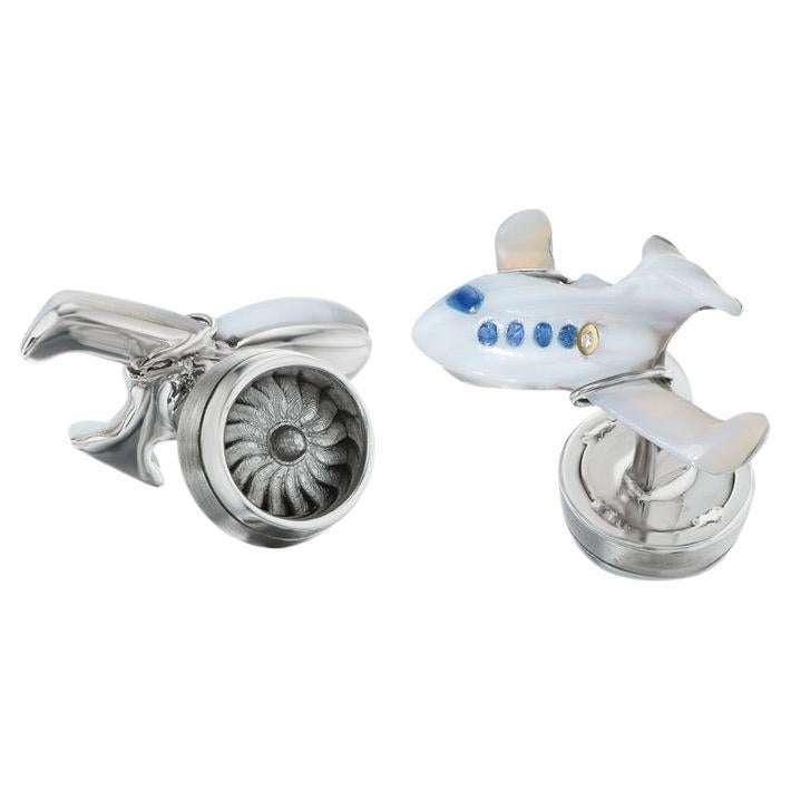 These exquisite cufflinks are for the true connoisseur of private aviation.  As the finest jets display their superiority in elite workmanship and attention to detail, so do these wonderful cufflinks.  The lightly striped agate fuselage and wings
