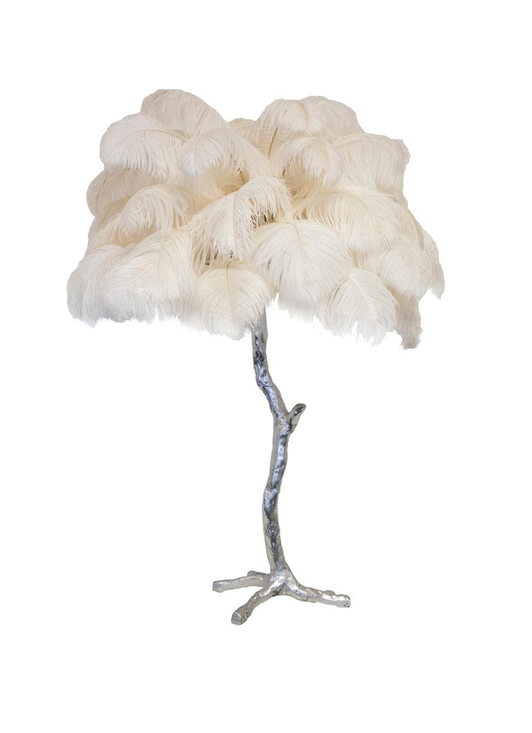 Our mini palm ostrich feather lamp is a bijoux version of the exquisite, illuminating ostrich feather floor lamp. Each piece delivers a glorious luxurious statement to any design or styling project - perfect in Pairs! Handmade in our Oxfordshire