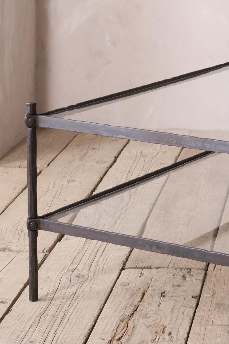 This is our 'Mjolnir' Coffee table. The hammer of Thor. An homage to the hammering techniques used in the manufacturing process. Made from forged steel and crafted right here in Yorkshire by Sam our incredible black smith.

The way Sam forges the
