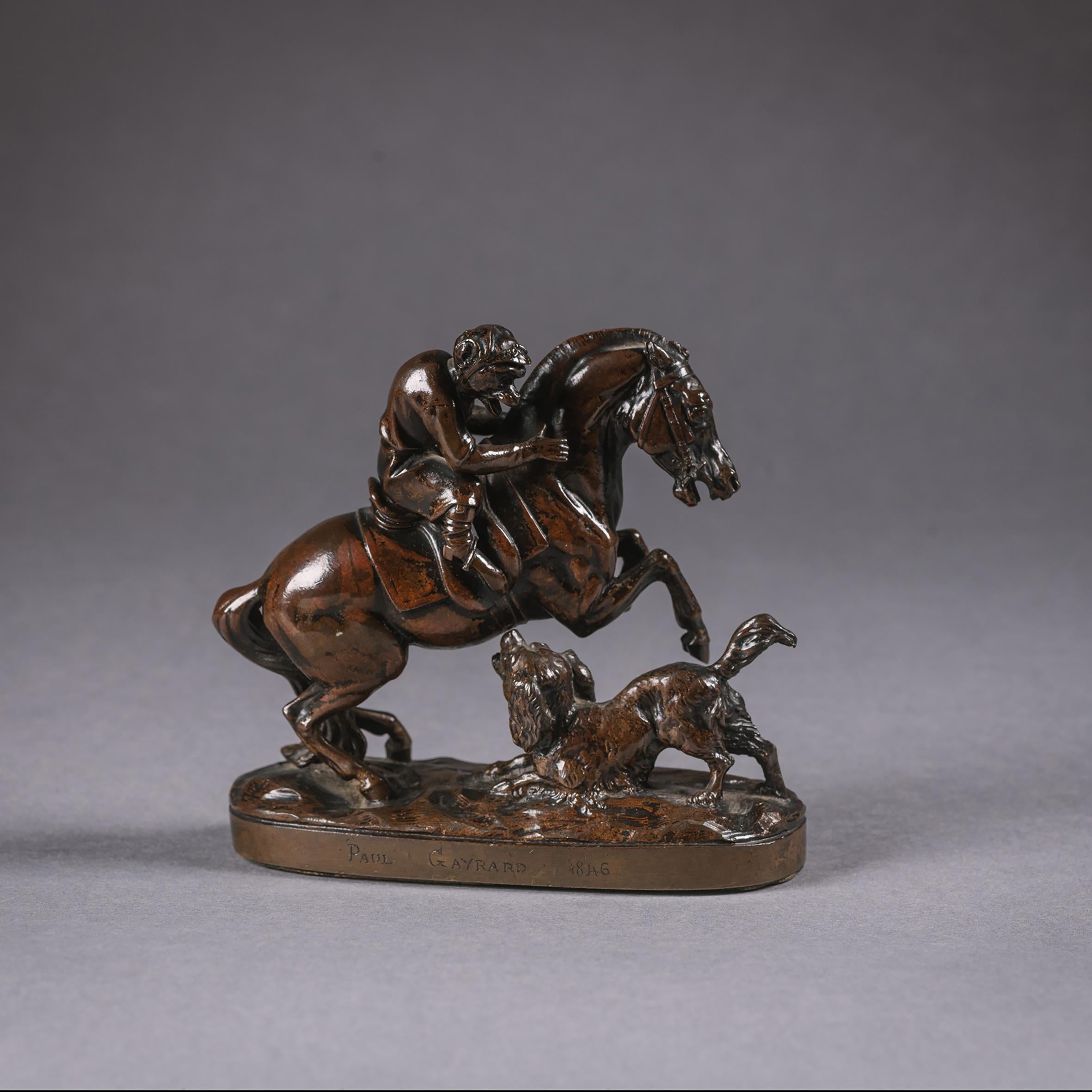‘The Monkey Rider’ – Paul Joseph Raymond Gayrard (1807 - 1855).

Signed to the base ‘Paul Gayrard’ and dated 1846. 

A rare patinated bronze group of a monkey in the guise of a Jockey riding a racehorse, startled by a barking dog at his feet. 
