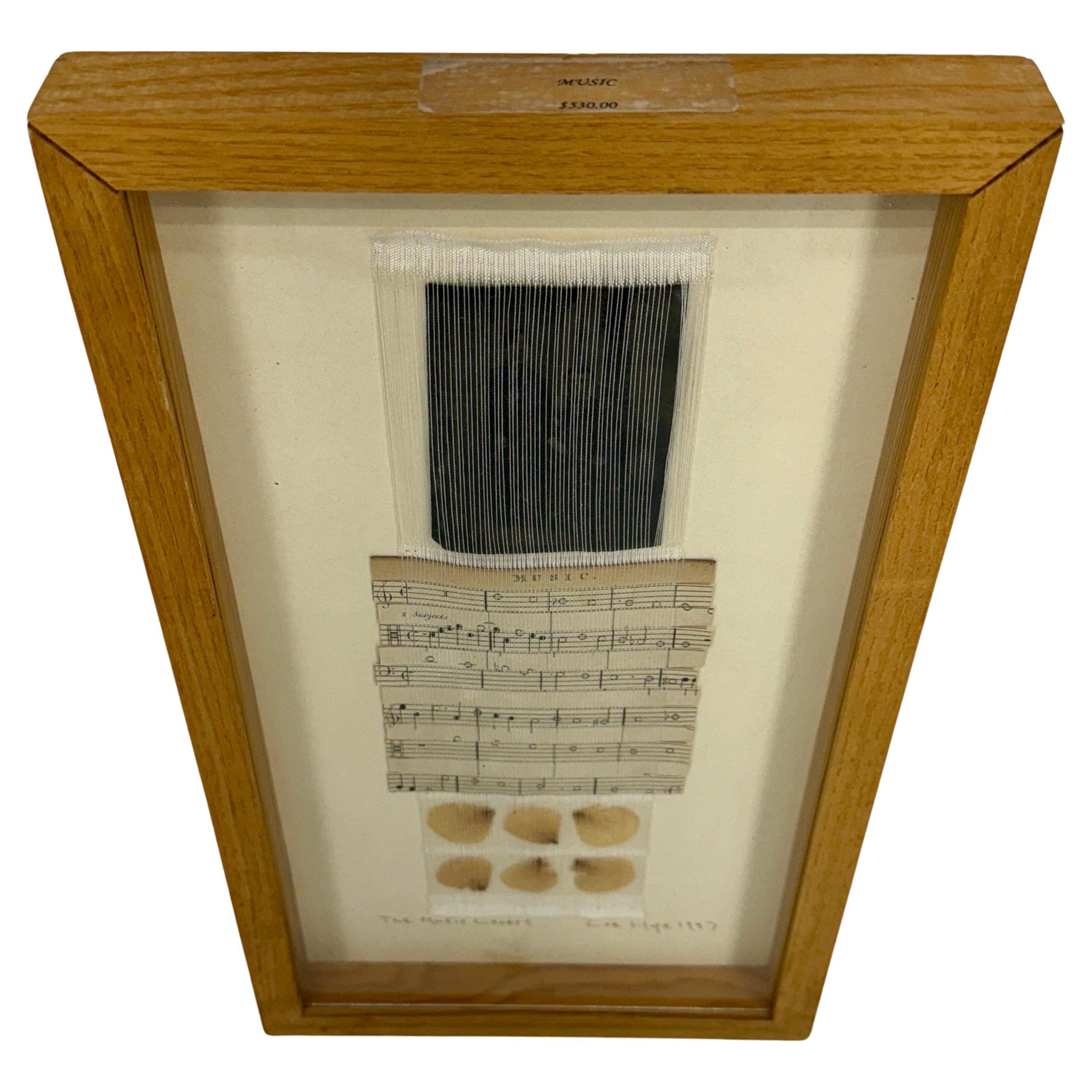 Zoe Hope The Music Lovers Collage 1997 Wall Art

The artist’s music collage incorporating paper, fabric textile , wire and sheet music all incased behind a glass wood frame. This one of a kind art would be a wonderful addition to add to a gallery