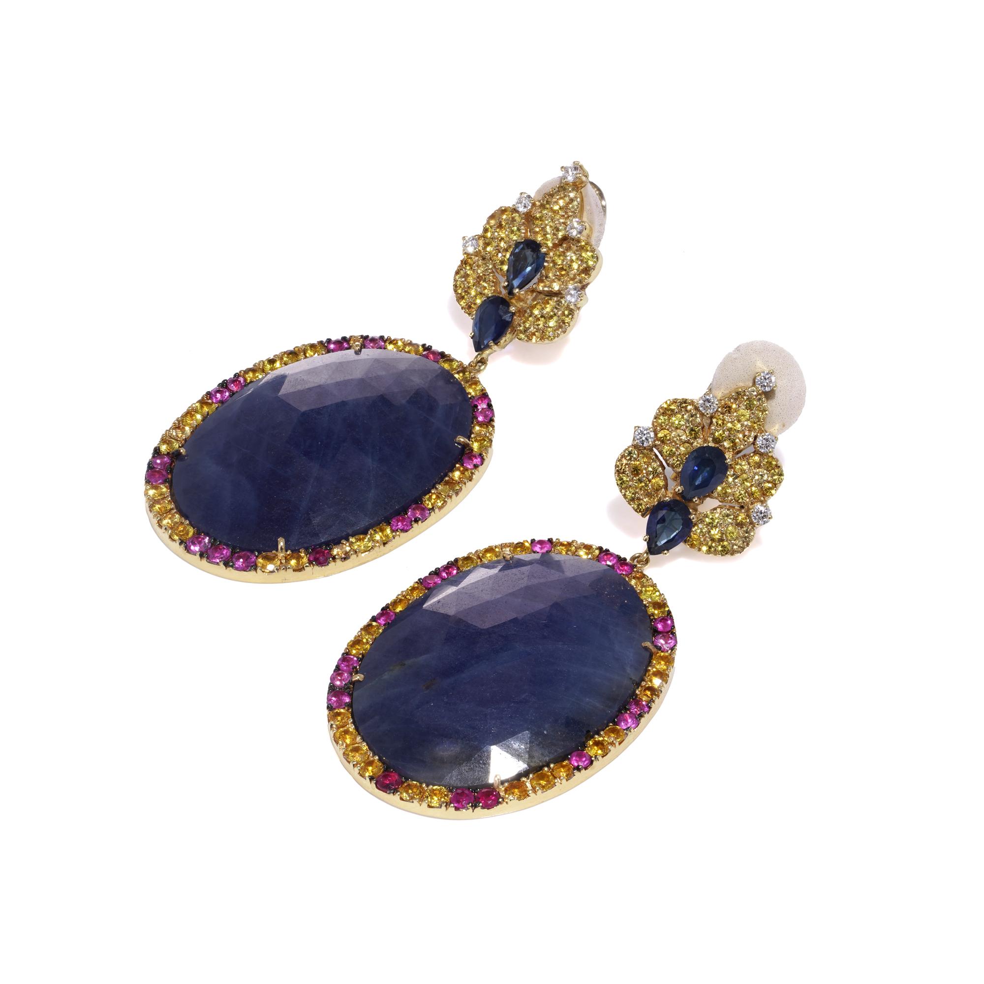The natural Blue, Pink and Yellow Sapphire and diamond dangle earrings.

Dimensions:
Length: 7 cm 
Width: 3.2 cm 
Weight: 52 grams 

The earrings feature an impressive oval rose - cut sapphire plaques surrounded by yellow and pink sapphires.
The