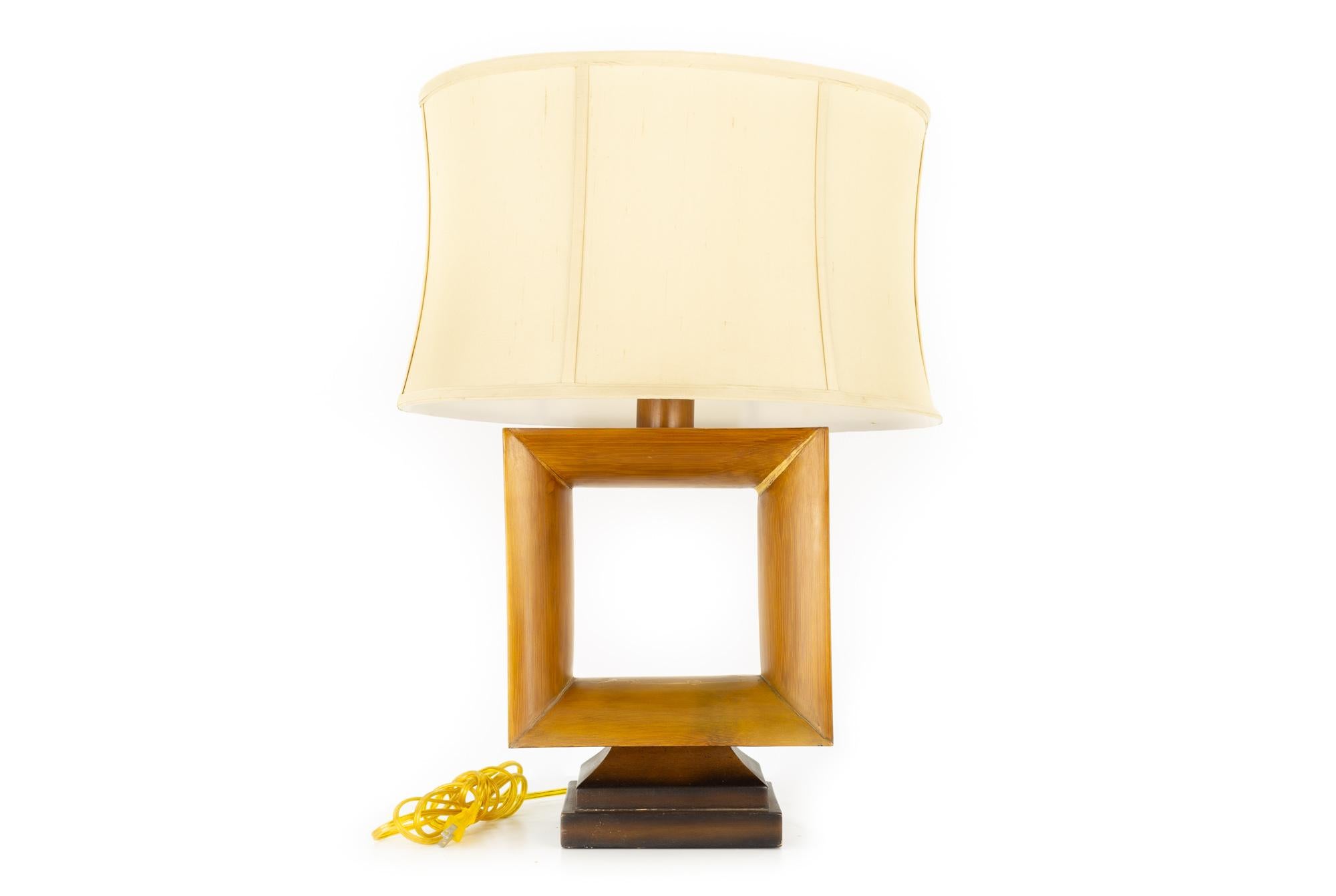 The natural light mid century square open window table lamp

This lamp measures: 11 wide x 5.5 deep x 27.5 inches high

This lamp is in great vintage condition with some wear on the wood

We take our photos in a controlled lighting studio to