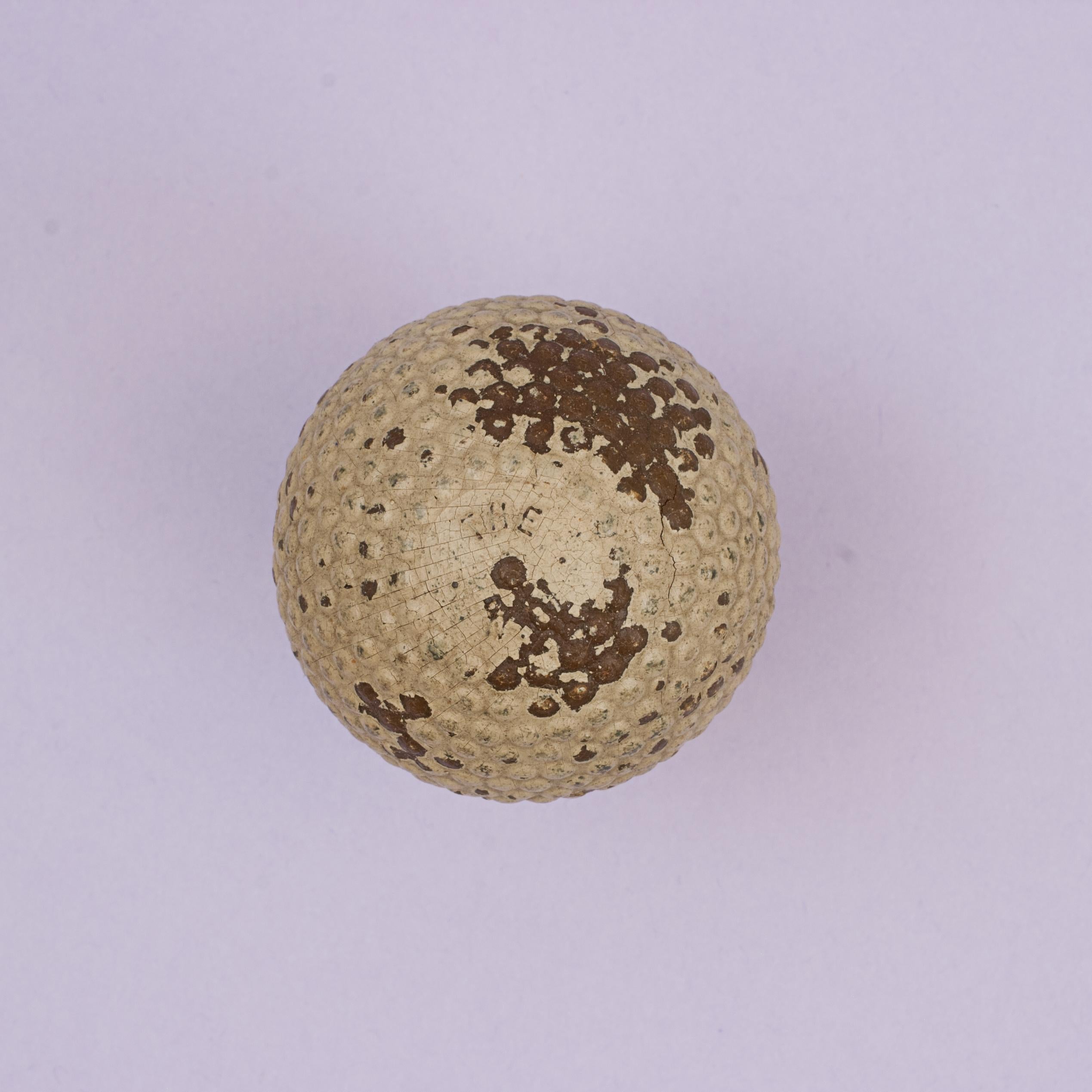 Bramble Pattern NB Golf Ball.
A good rare example of a 'NB' bramble patterned rubber core golf ball. The NB golf ball is very rarely seen, is in good original condition and is manufactured by W.T. Henley's, 27 Martins Lane, Cannon Street, London,