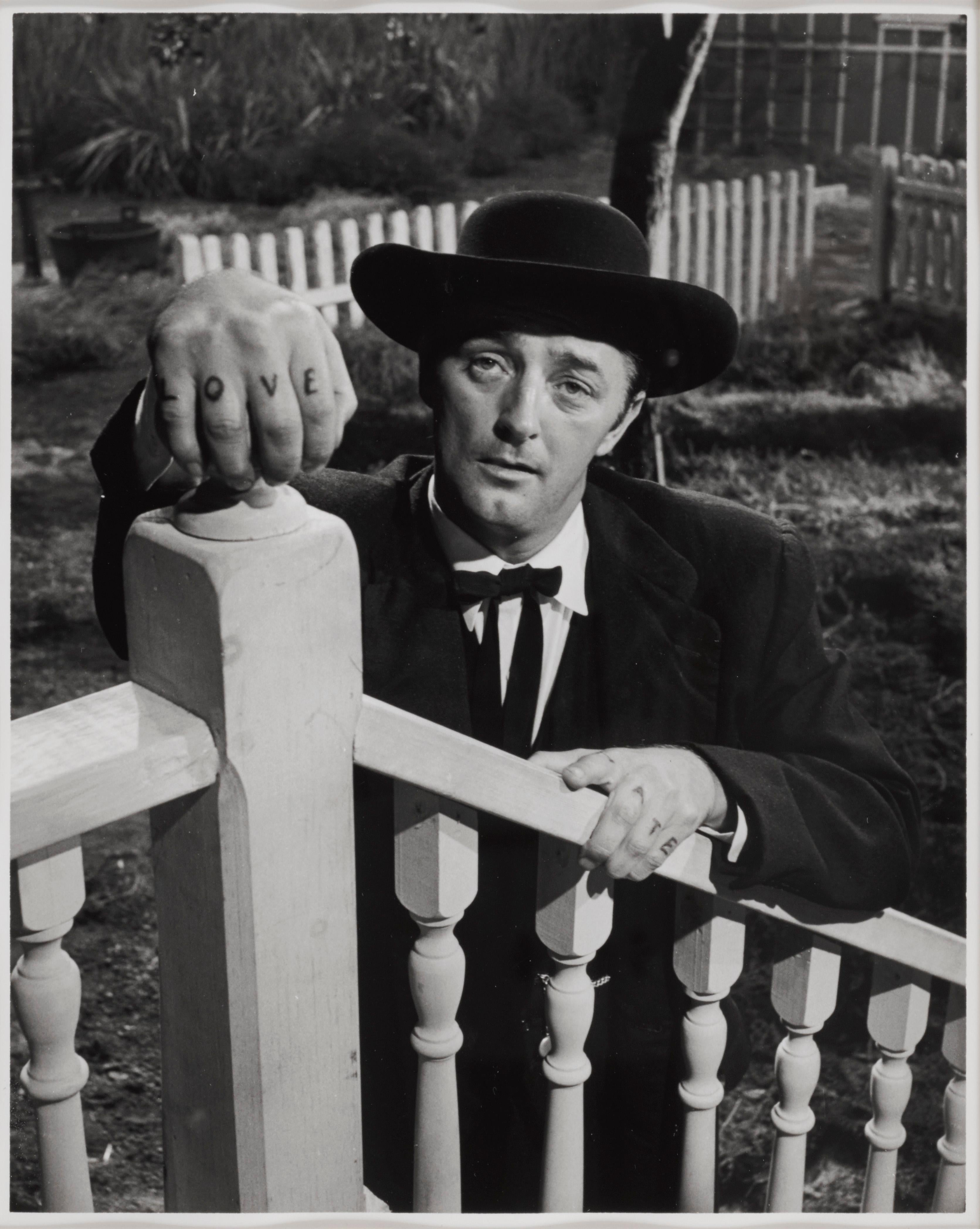 Original photographic production still for the 1955 Film Noir The Night of the Hunter. The film starred Robert Mitchum, Shelley Winters and was directed by Charles Lamont. Mitchum gives on of the greatest acting performance in this film. This image