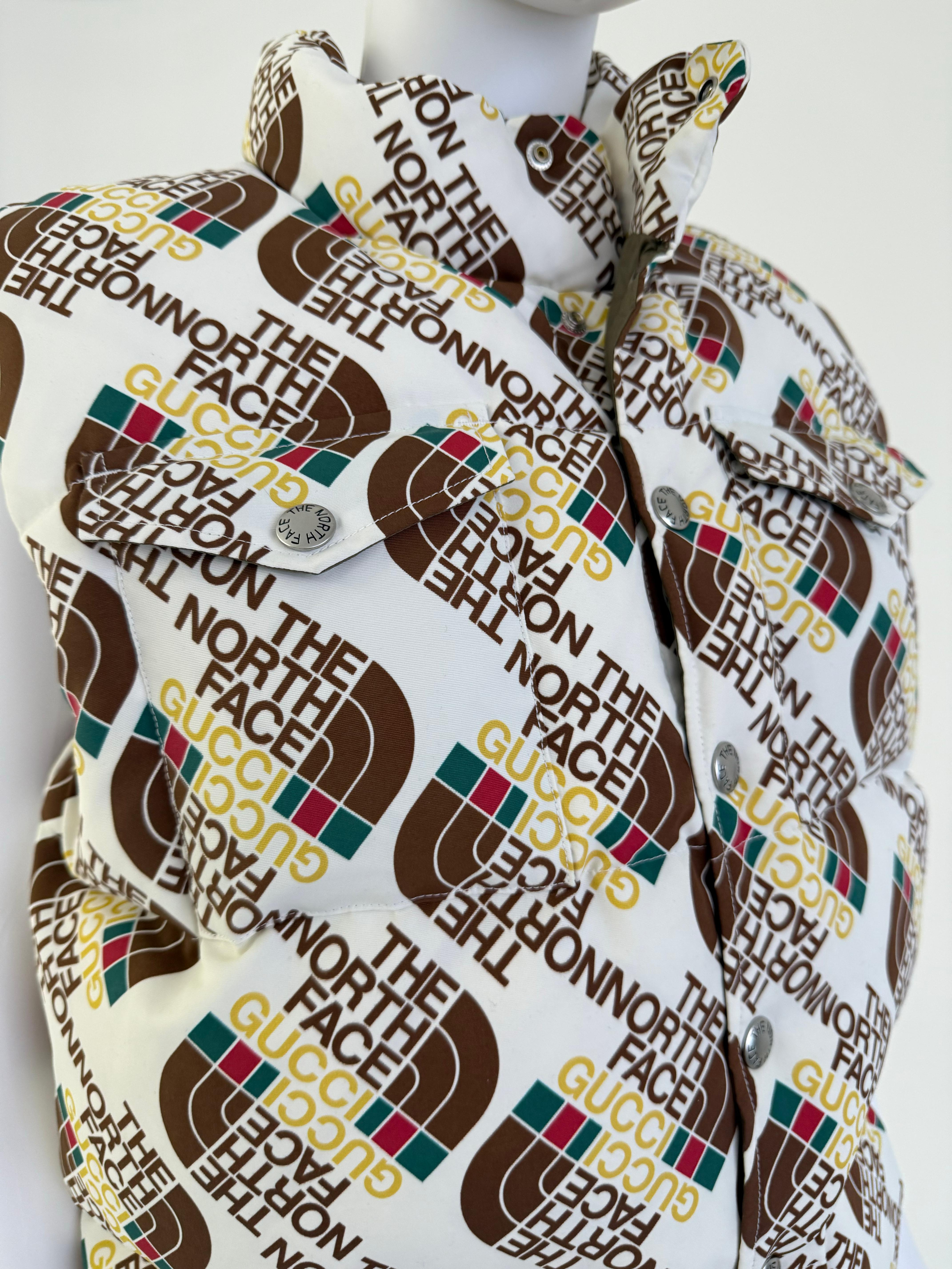 Title: Gucci x The North Face Down Puffer Vest, Medium, Collaboration Logo Print, UNISEX

Own a piece of fashion history with this highly sought-after Gucci x The North Face down puffer vest! This limited-edition collaboration piece showcases the