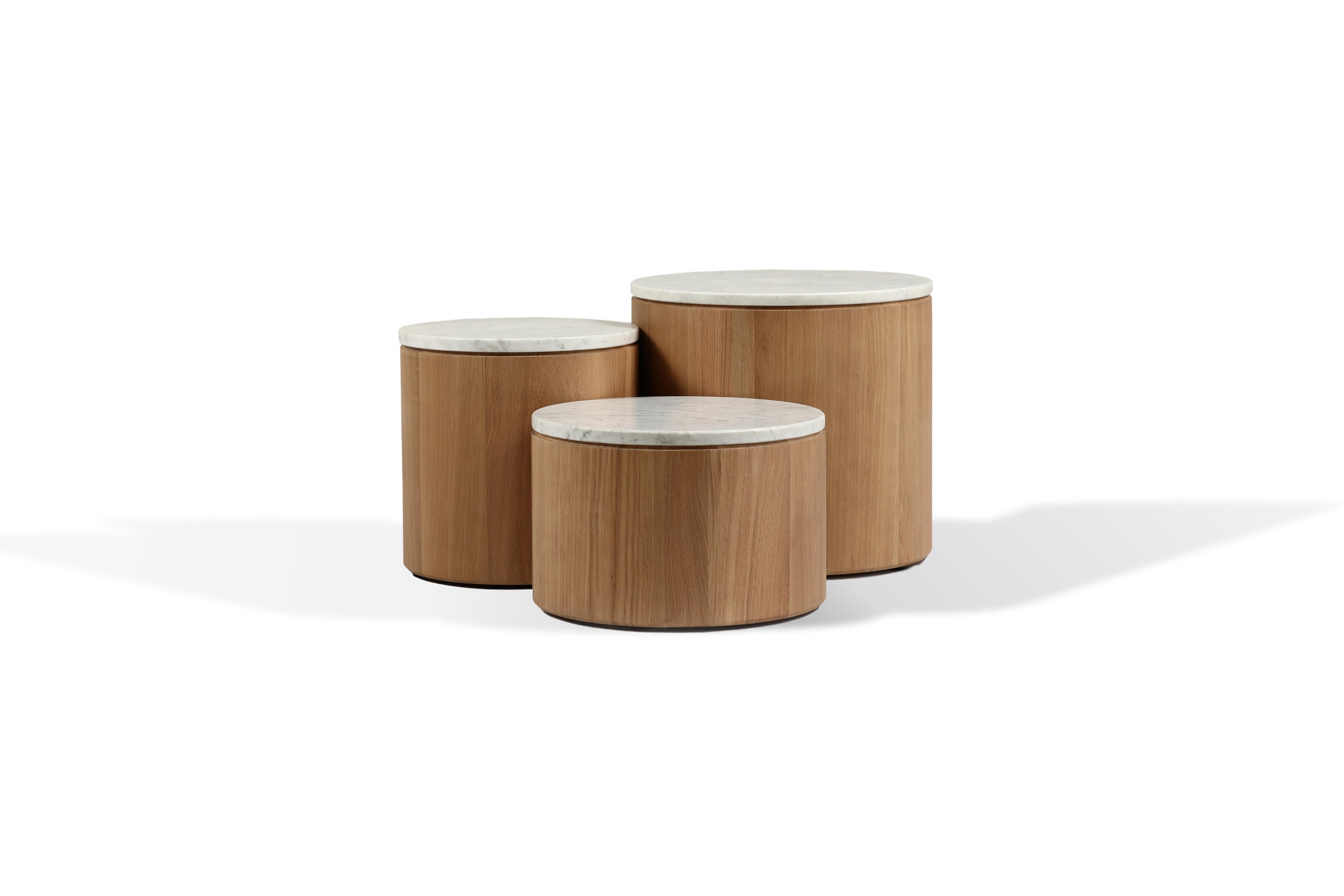 Dugtree is a concept consisting of 3 coffee tables of different sizes and heights. The geometry of the products keeps the same roundness of the legs specific to The Oak Saga collection. 
 
The top consists of a marble circle carefully placed on