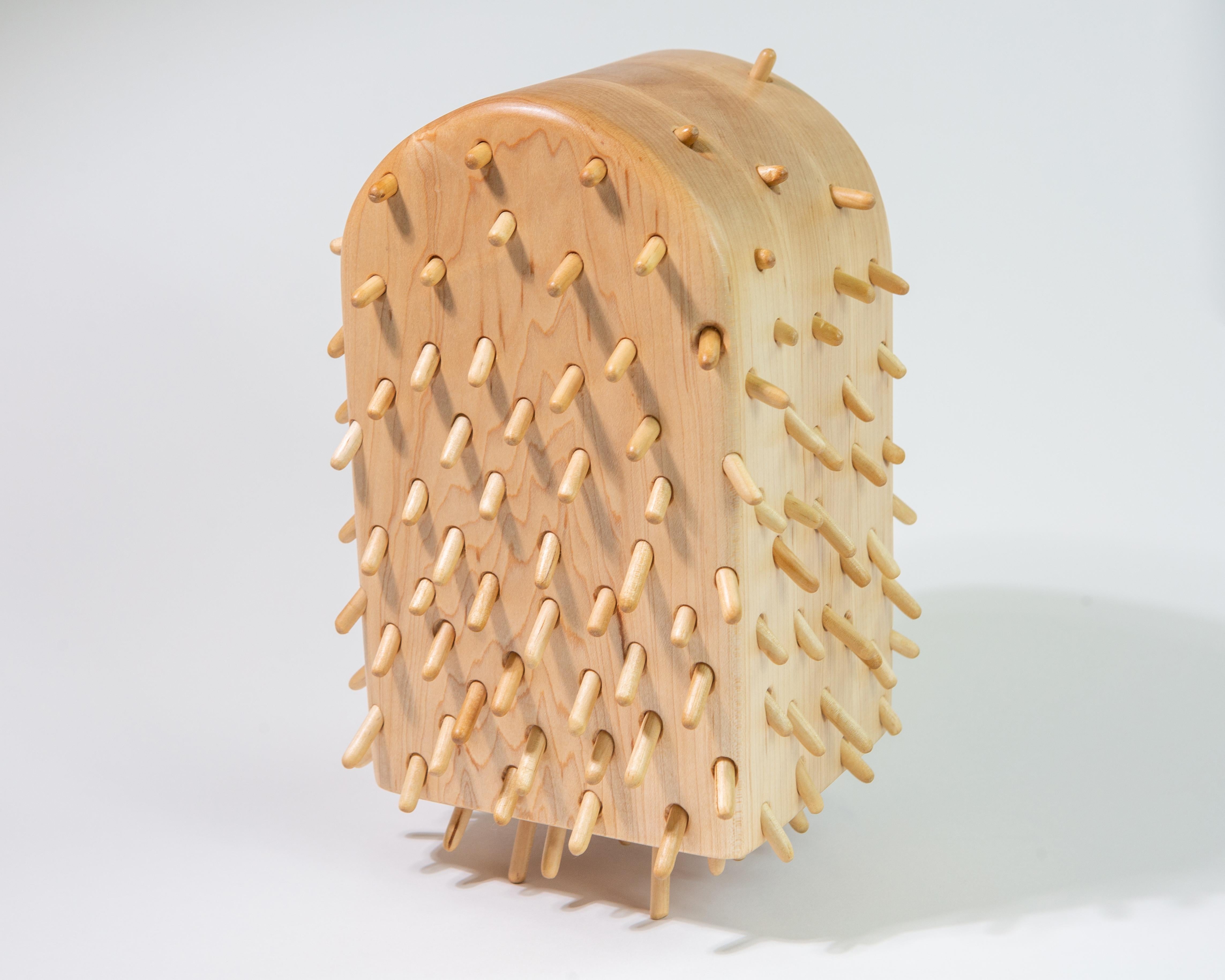 Sculpture. Maple mass with birch, maple and oak cilia.