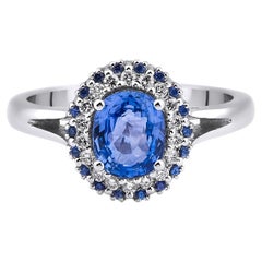 The Ocean Sapphire And Diamond Halo Engagement Ring
