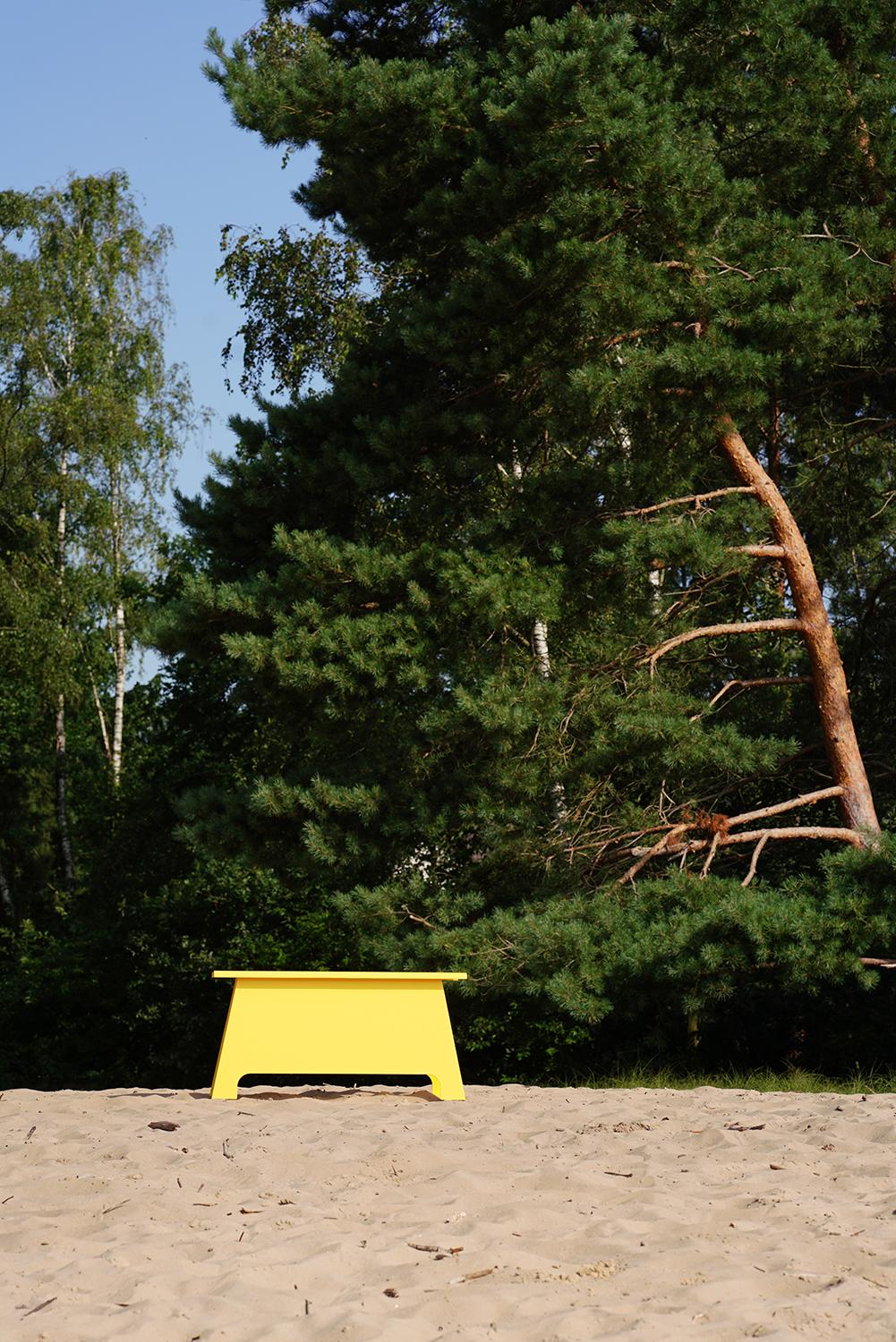 yellow metal bench