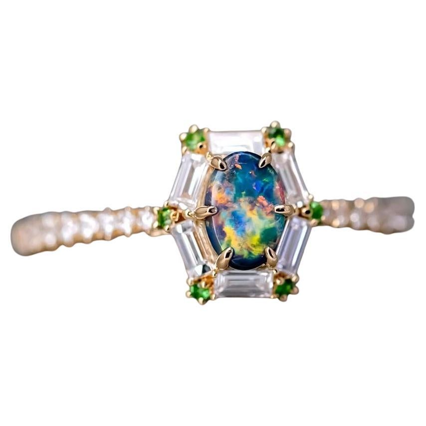 The One - Bague de fiançailles en or 18 carats ornée d'une opale noire, d'un diamant taille baguette et d'une tsavorite en vente