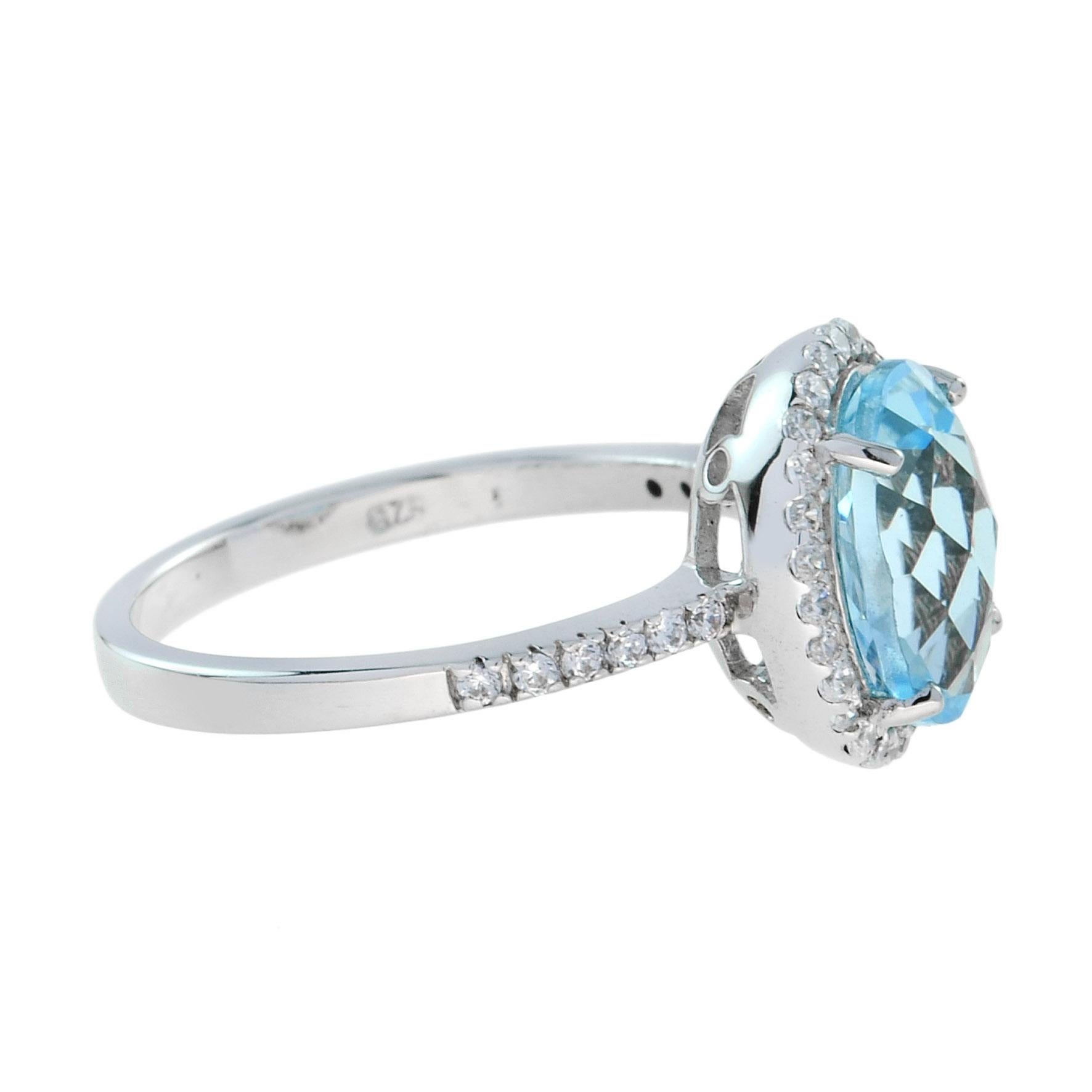 For Sale:  Classic Oval Blue Topaz with Diamond Engagement Ring in 18K White Gold 3