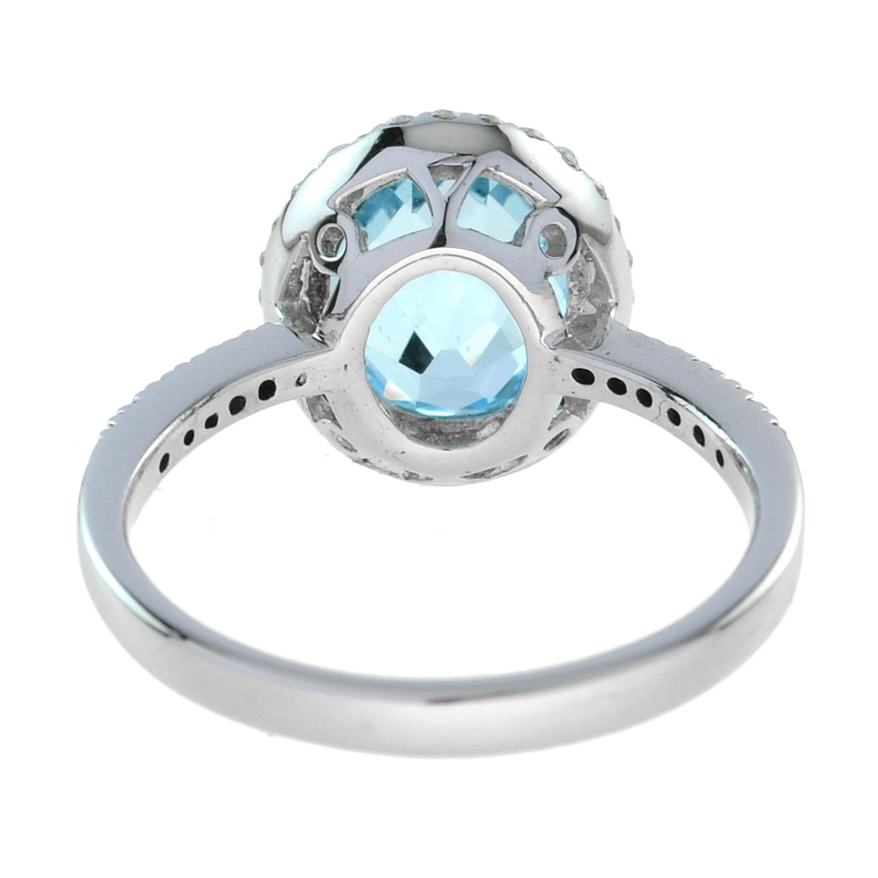 For Sale:  Classic Oval Blue Topaz with Diamond Engagement Ring in 18K White Gold 5