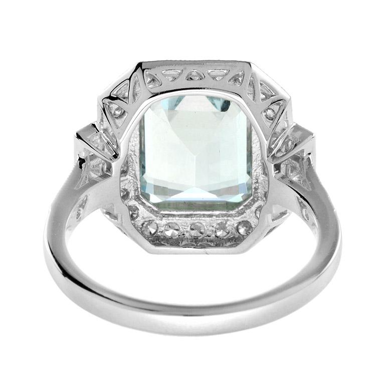 For Sale:  Emerald Cut Aquamarine with Diamond Halo Engagement Ring in 18K White Gold 6