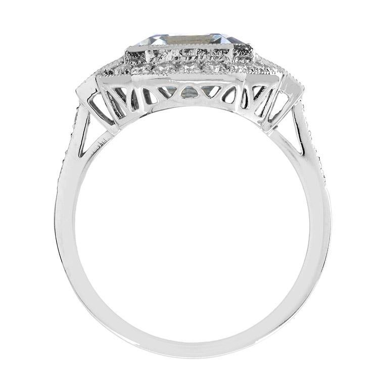 For Sale:  Emerald Cut Aquamarine with Diamond Halo Engagement Ring in 18K White Gold 7