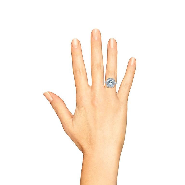 For Sale:  Emerald Cut Aquamarine with Diamond Halo Engagement Ring in 18K White Gold 9