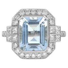 One Emerald Cut Aquamarine with Diamond Engagement Ring in 18K White Gold