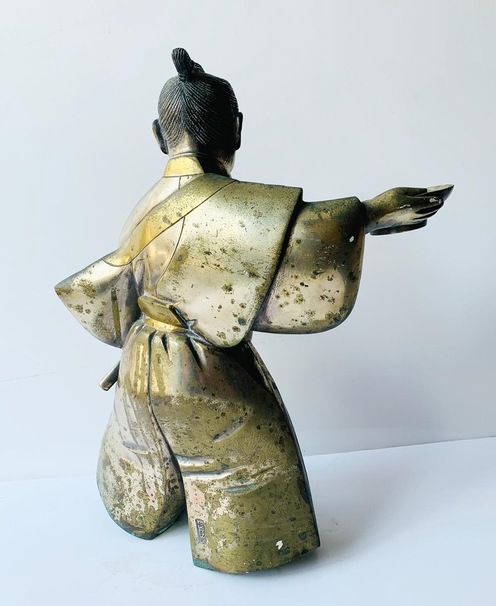 Stunning Japanese sculpture made in solid brass and titled THE ONE.

The sculpture shows great attention to detail, the brass has aged and has a verdigris patina towards the bottom of the sculpture.

Makers mark on the