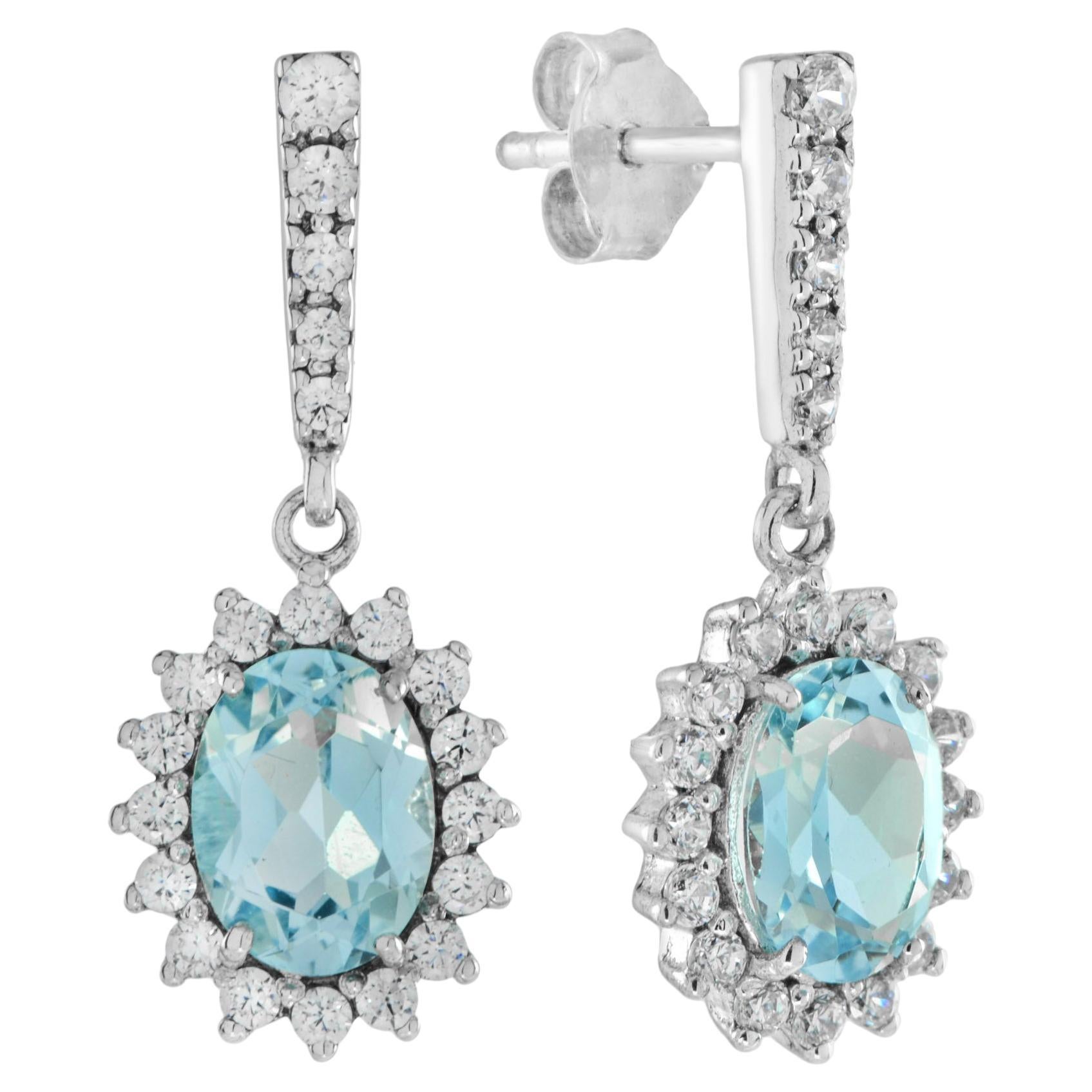 One Oval Blue Topaz with Diamond Halo Drop Earrings in 14K White Gold For Sale